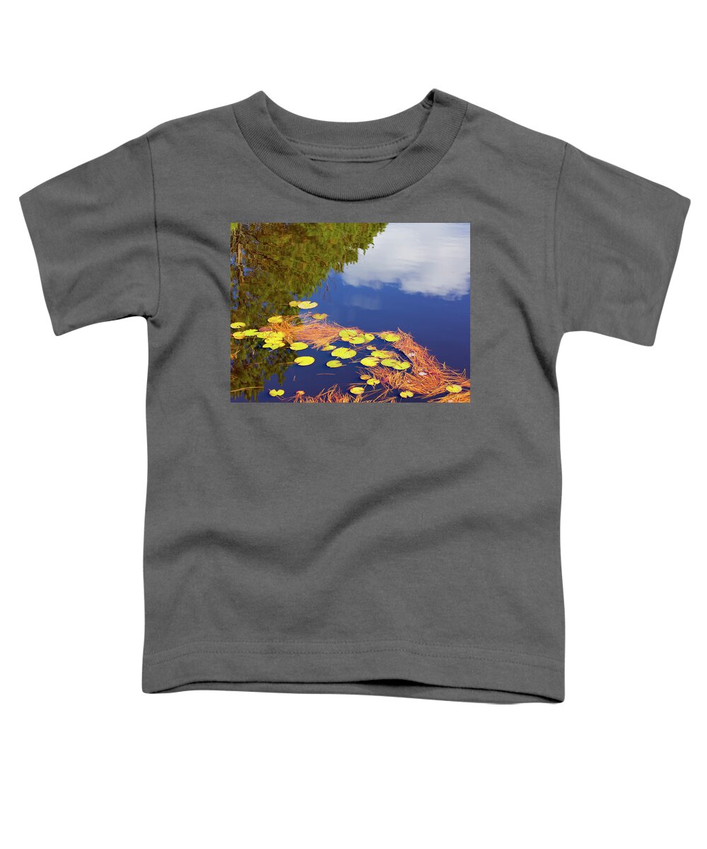 Blue Toddler T-Shirt featuring the photograph Reflections in a lily pond by Charles Floyd