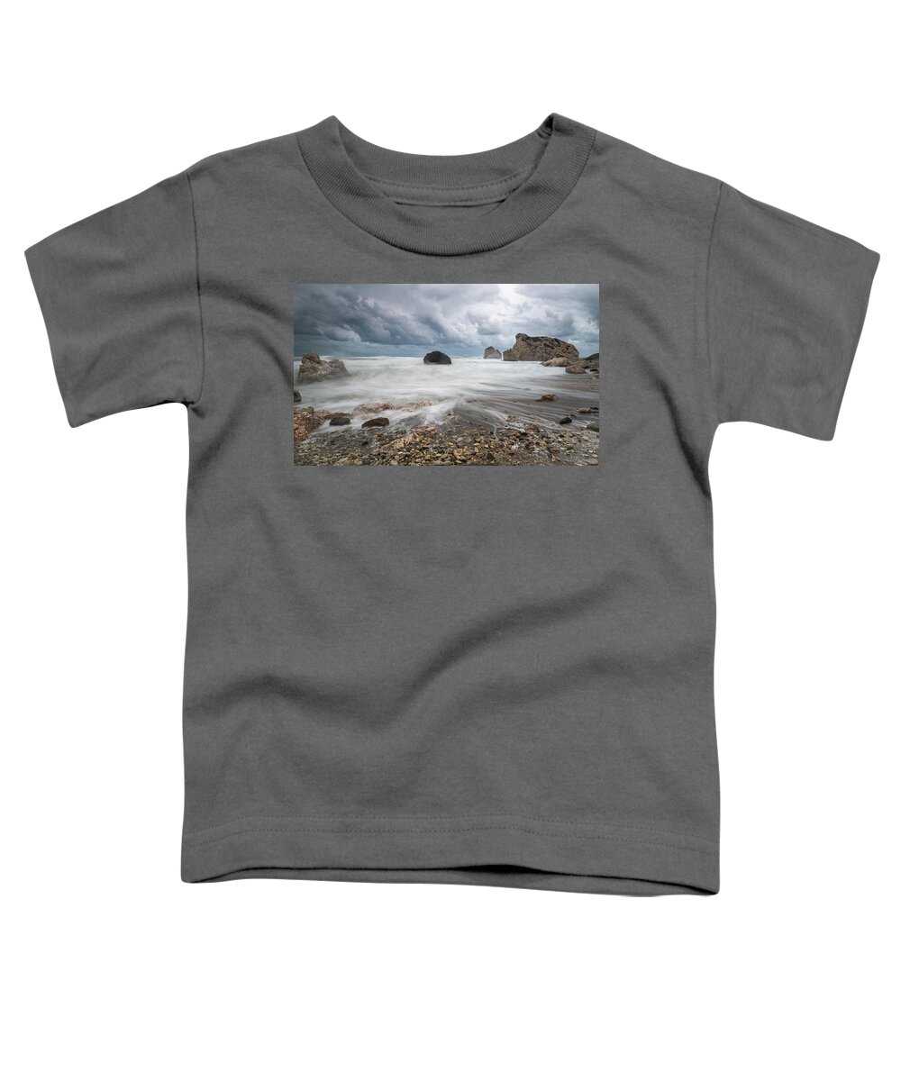 Seascape Toddler T-Shirt featuring the photograph Seascape with windy waves during storm weather at the a rocky co by Michalakis Ppalis