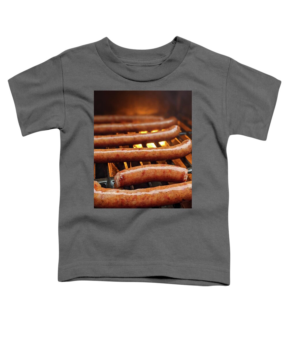 Asada Toddler T-Shirt featuring the photograph Smoked Southern Sausages On A Grille Ready To Eat by Alex Grichenko