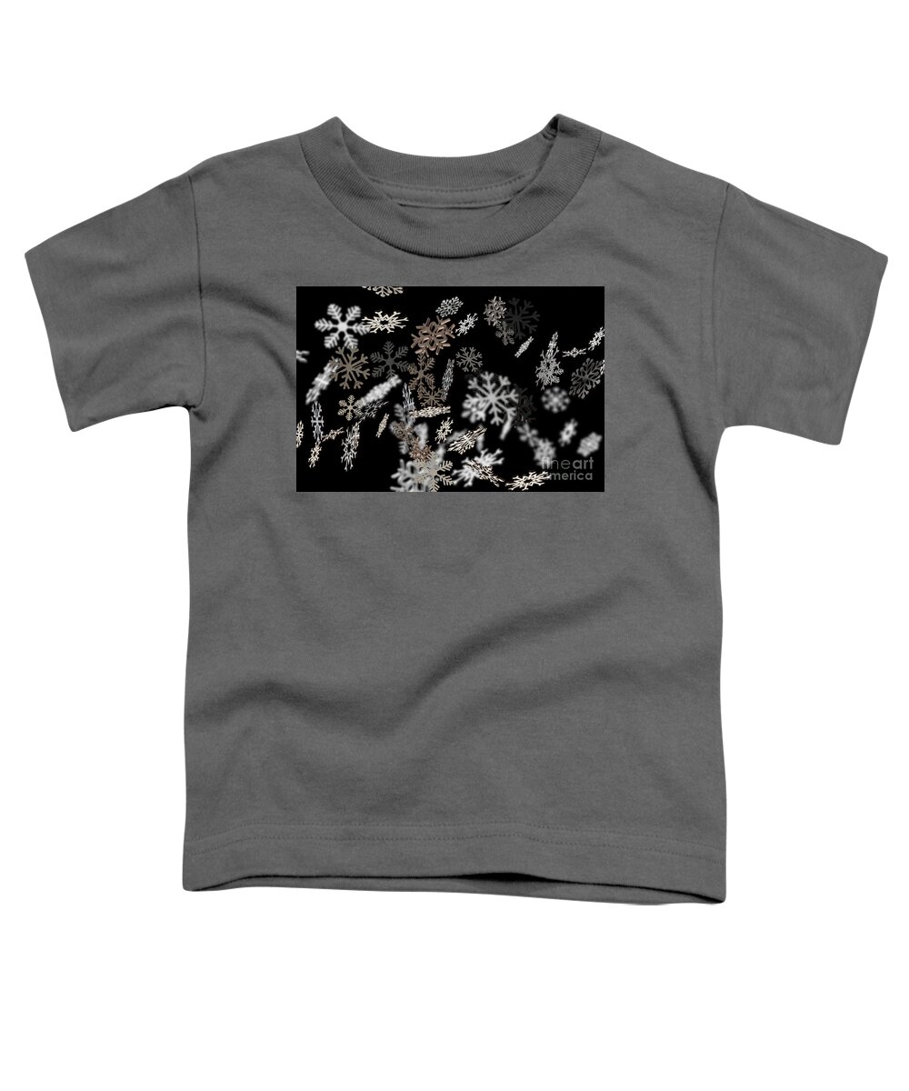 Snowflake Toddler T-Shirt featuring the photograph Stylish falling snowflakes pattern on black by Simon Bratt