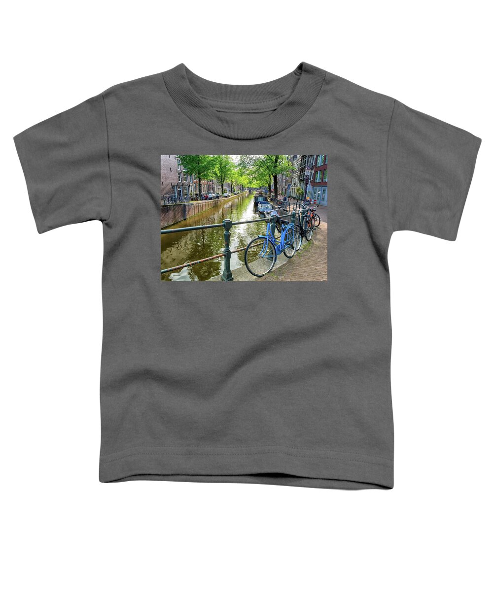 Tradition Toddler T-Shirt featuring the photograph Typical canal and bikes in Amsterdam, Netherlands by Elenarts - Elena Duvernay photo