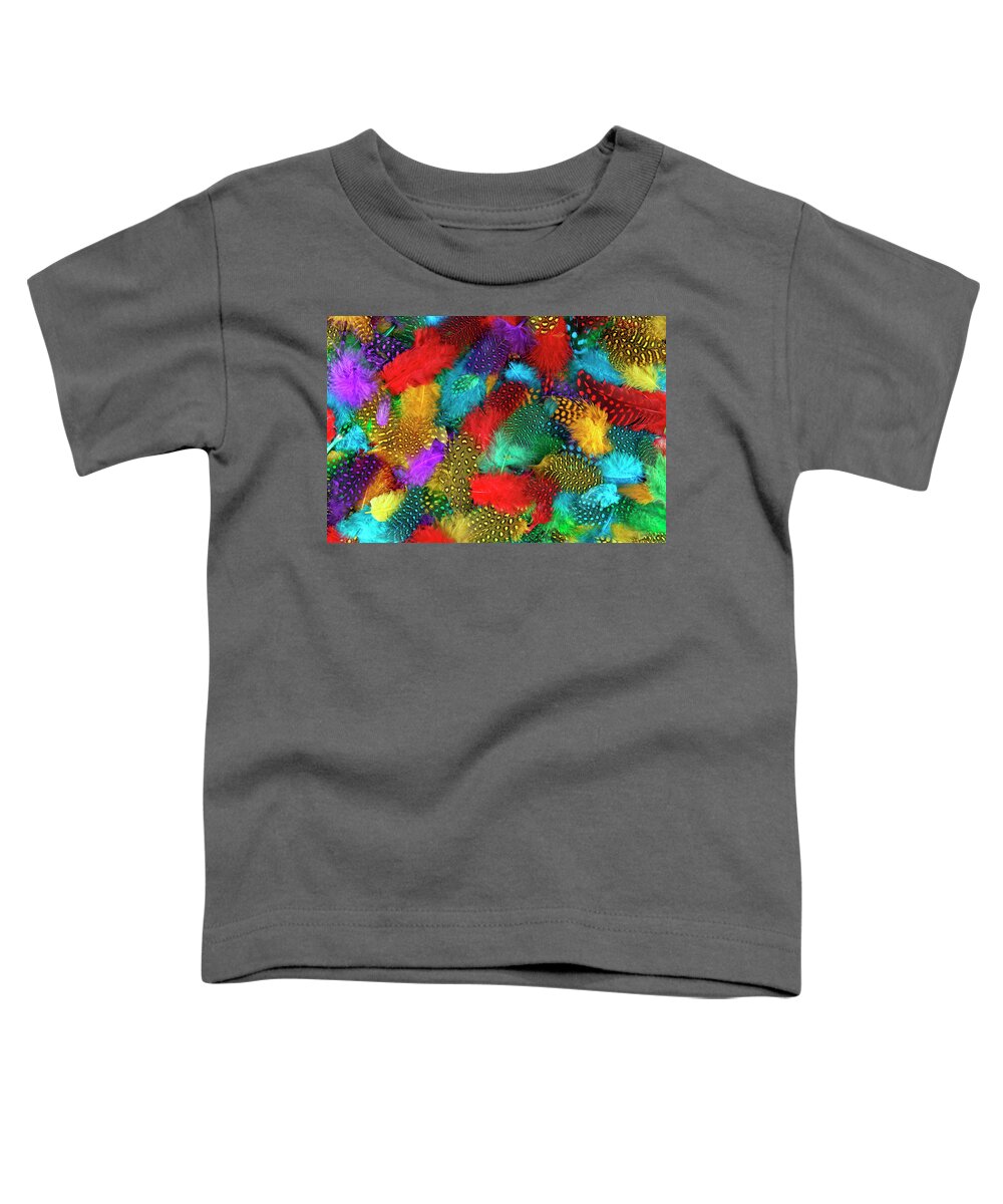 Feathers Toddler T-Shirt featuring the photograph Various color feather background by Severija Kirilovaite