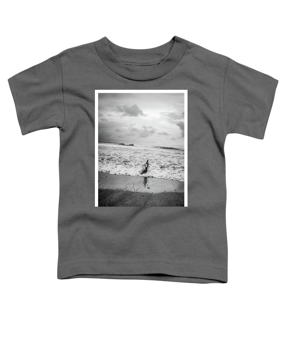 Surfer.surfing Toddler T-Shirt featuring the photograph Young Surfer by Tito Slack
