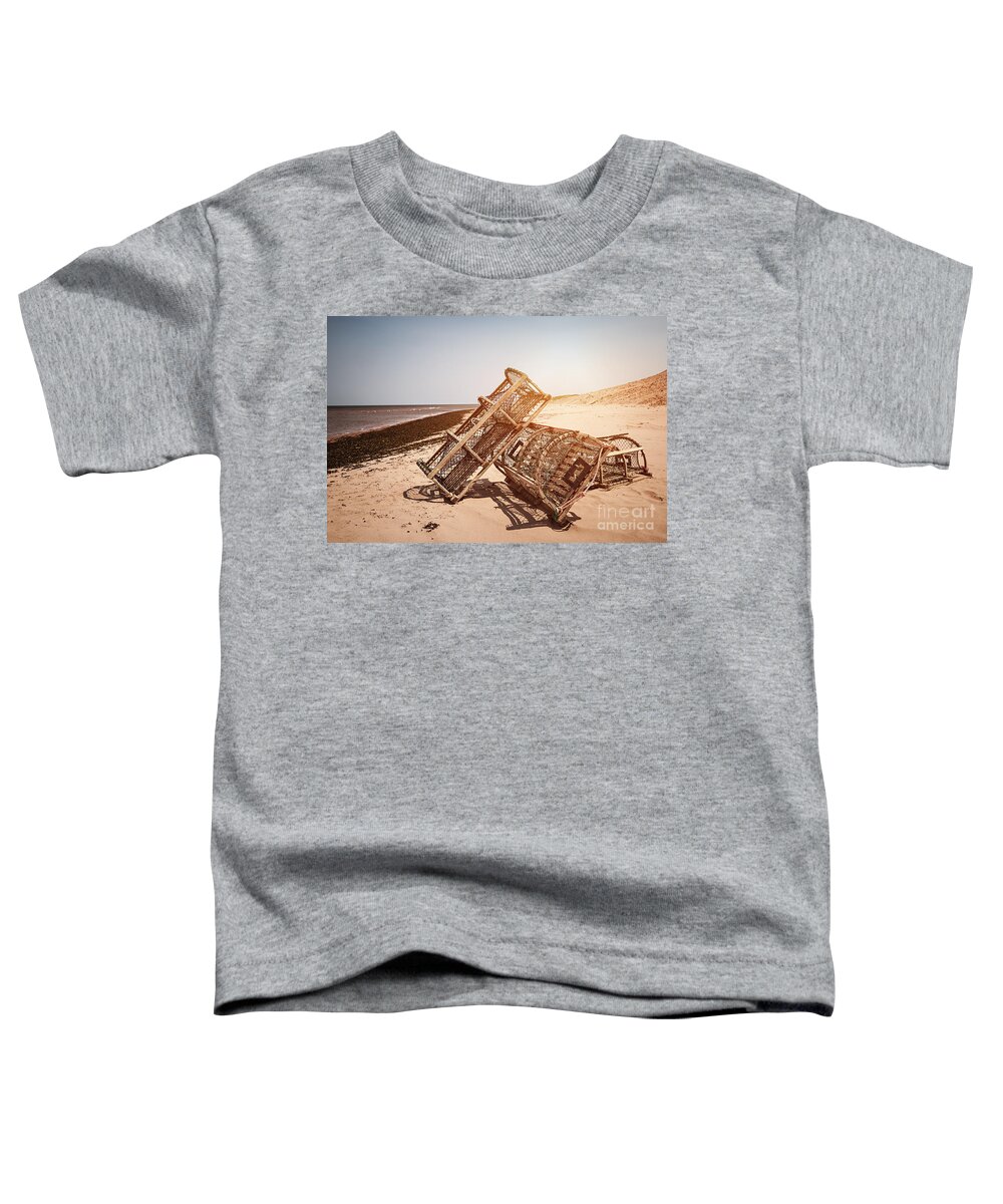 Lobster Toddler T-Shirt featuring the photograph Lobster traps on beach #2 by Elena Elisseeva