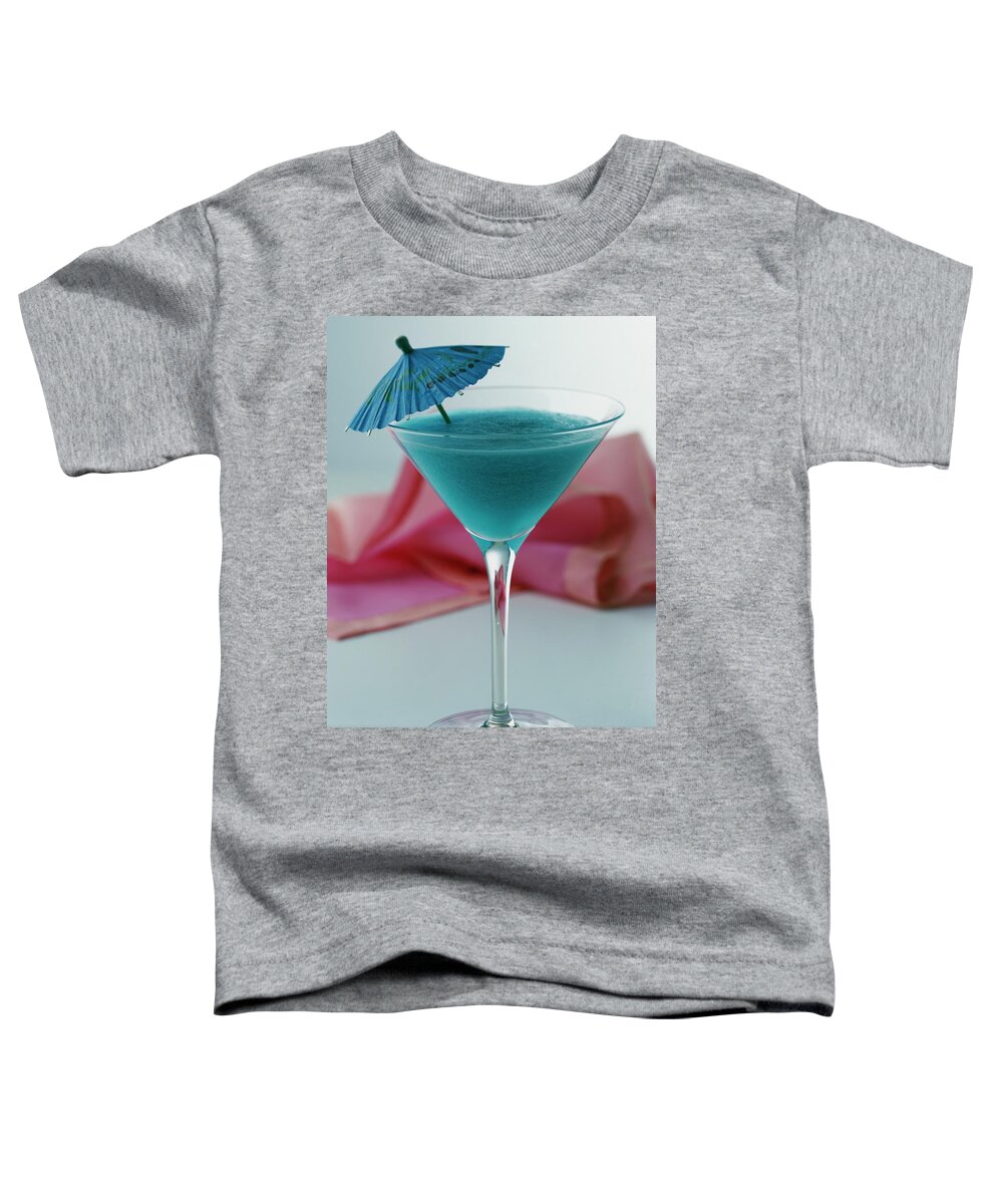 Beverage Toddler T-Shirt featuring the photograph A Blue Hawaiian Cocktail by Romulo Yanes