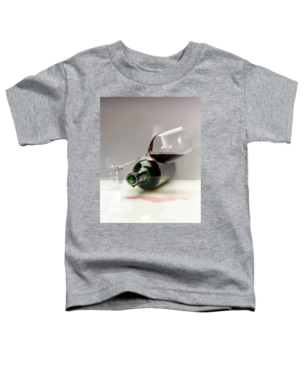 Beverage Toddler T-Shirt featuring the photograph A Wine Bottle And A Glass Of Wine by Romulo Yanes