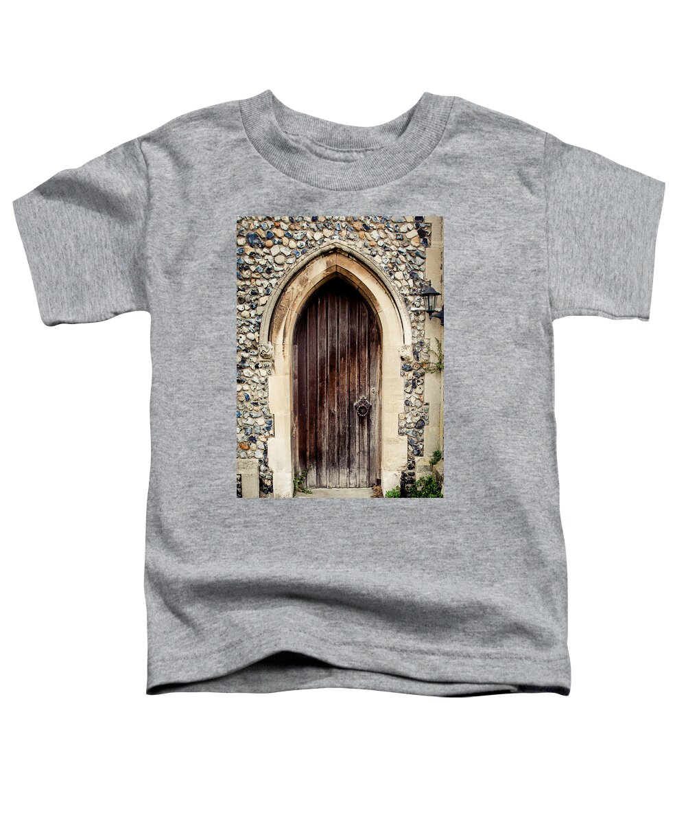 All Saints Church Toddler T-Shirt featuring the photograph All Saints Church Door by Karen Varnas