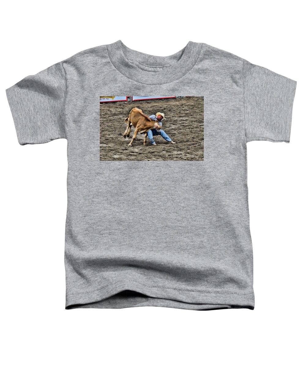 Rodeo Toddler T-Shirt featuring the photograph Bull Dogging by Ron Roberts