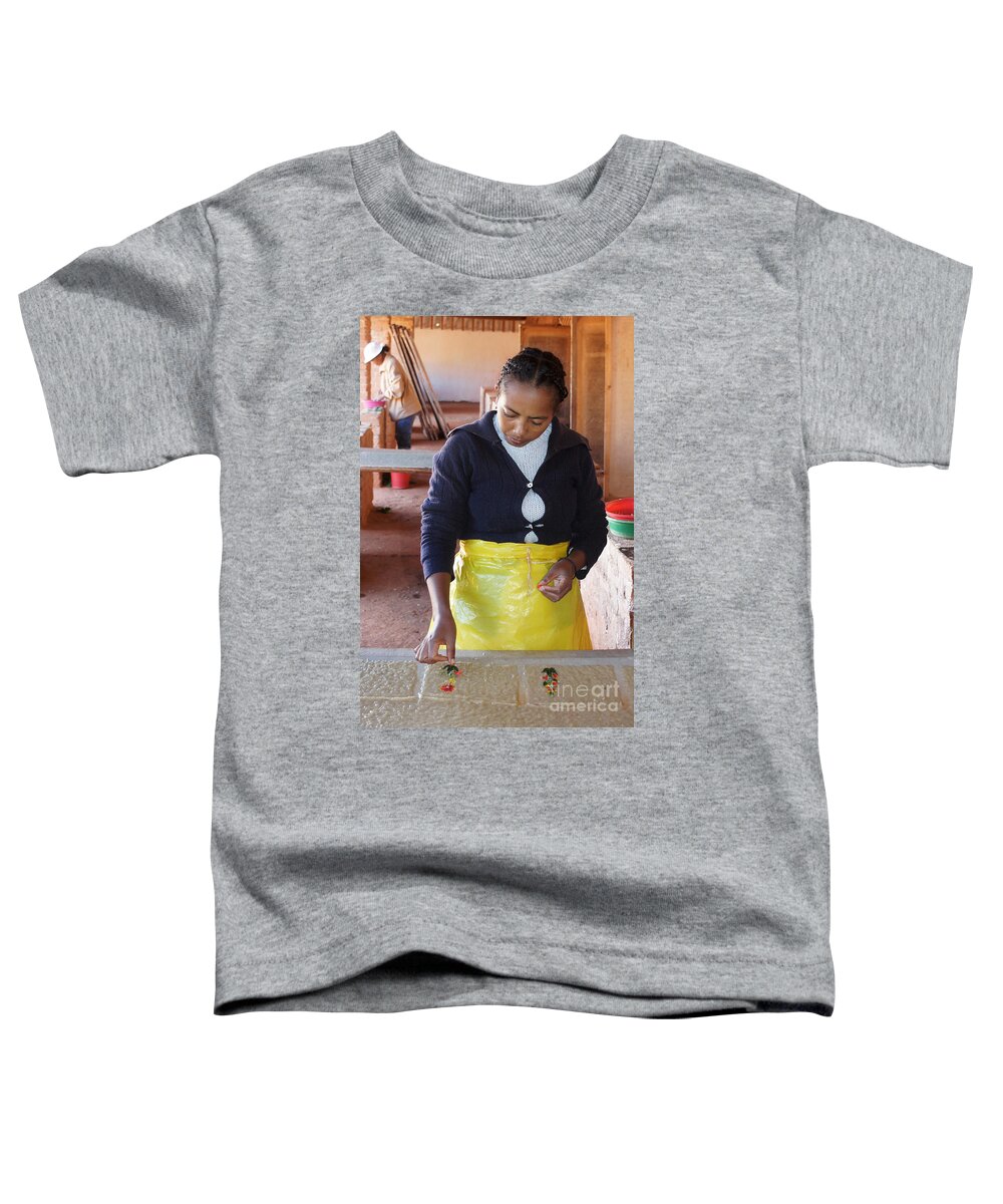 Madagascar Toddler T-Shirt featuring the photograph hand papermaking in Madagascar 2 by Rudi Prott