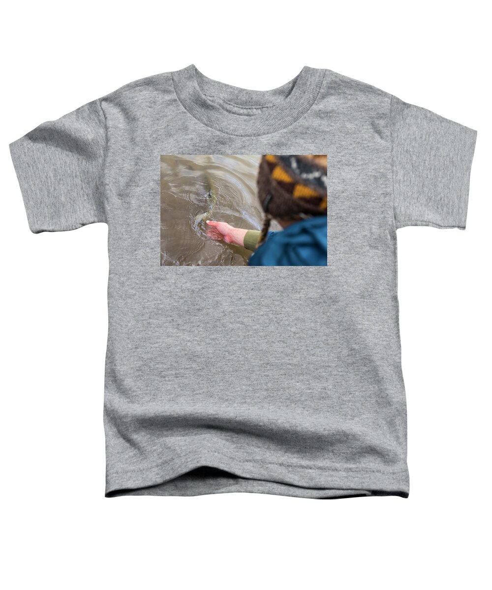 Caucasian Ethnicity Toddler T-Shirt featuring the photograph High Angle View Of A Person Releasing by Wray Sinclair