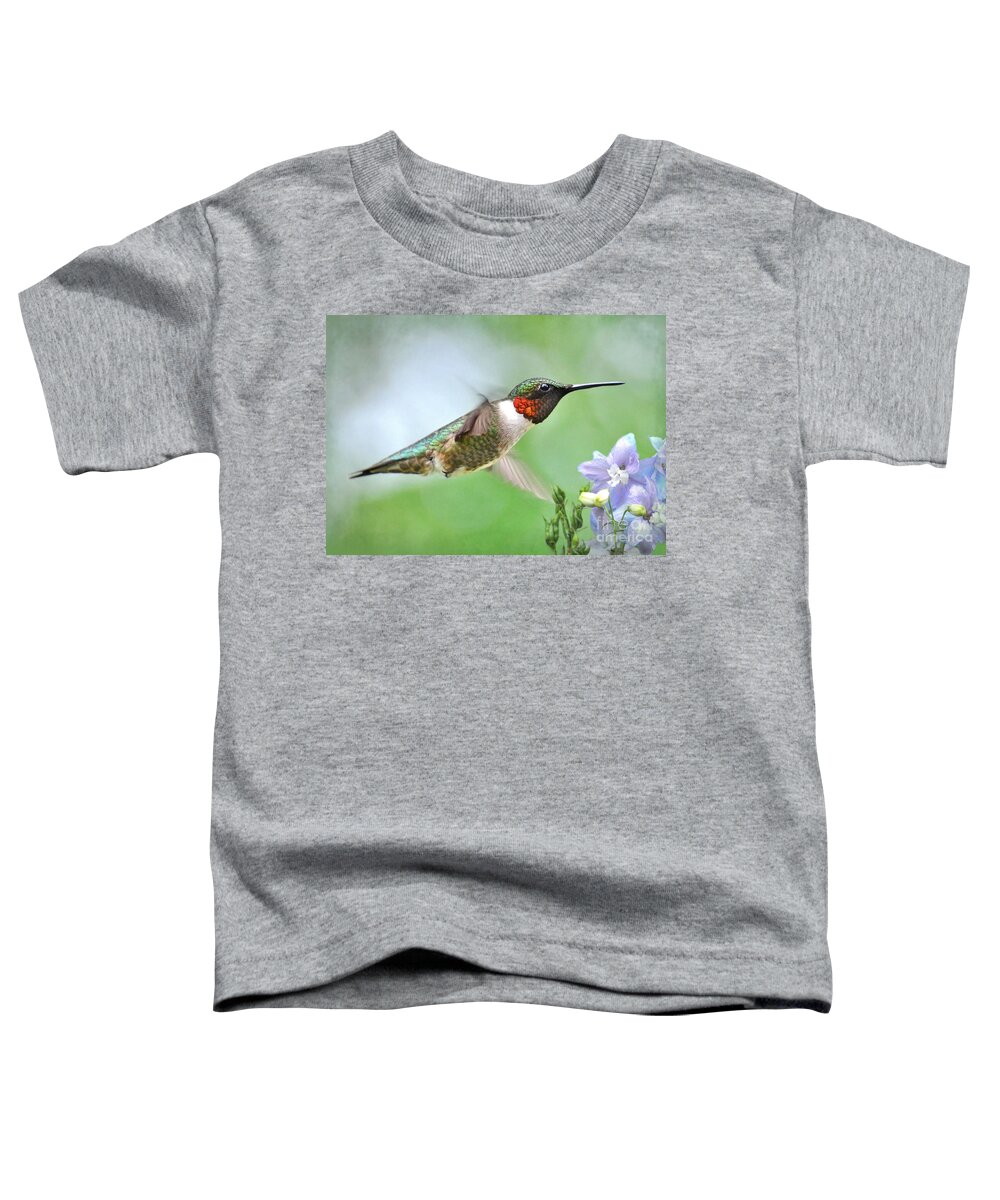 Hummingbird Toddler T-Shirt featuring the photograph Male Hummingbird Hovering Over Lavender Lapspar Flowers by Kathy Baccari