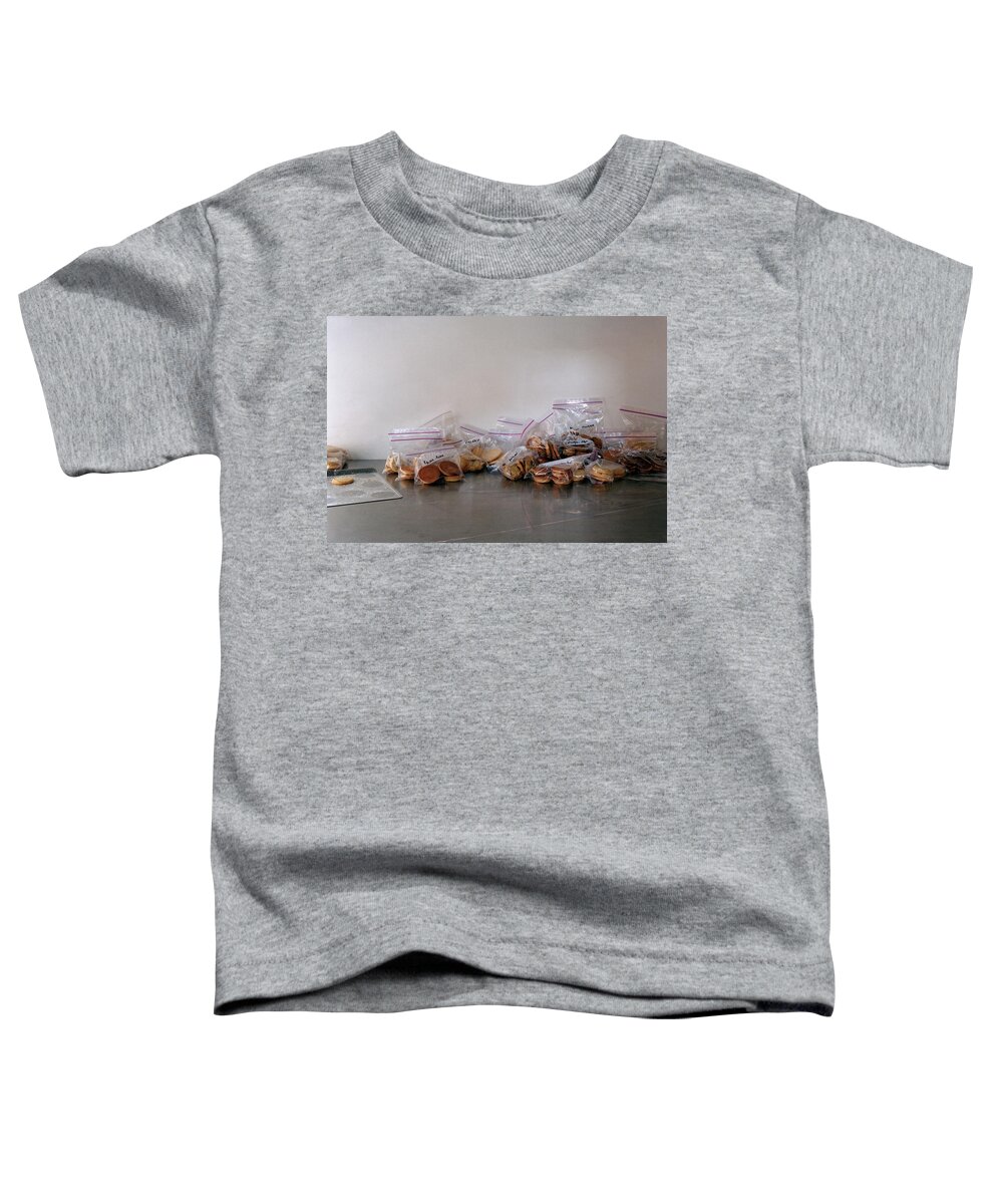 Cooking Toddler T-Shirt featuring the photograph Plastic Bags Of Cookies by Romulo Yanes