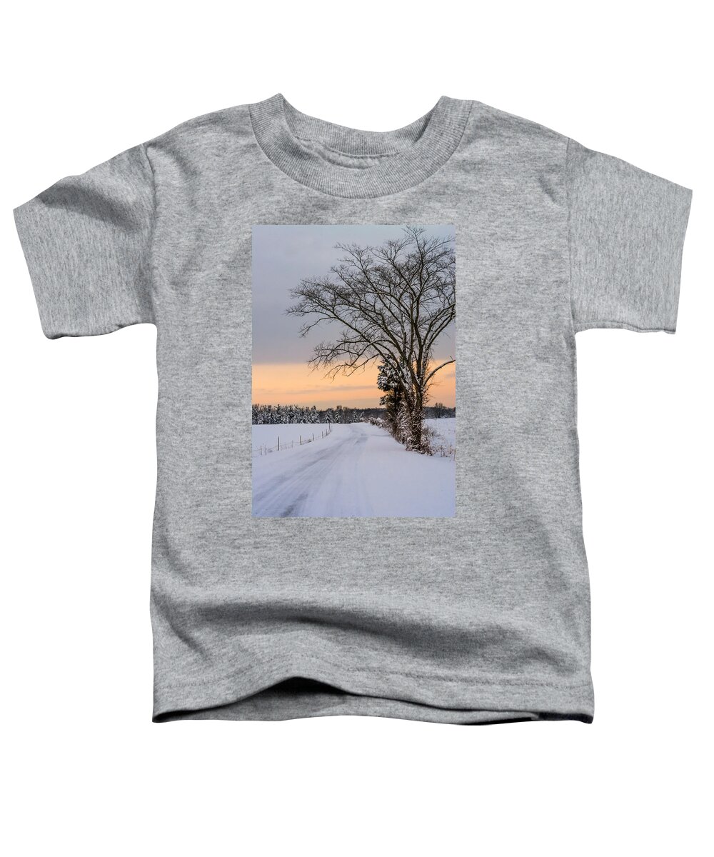 Snow Toddler T-Shirt featuring the photograph Snowy Country Road by Holden The Moment
