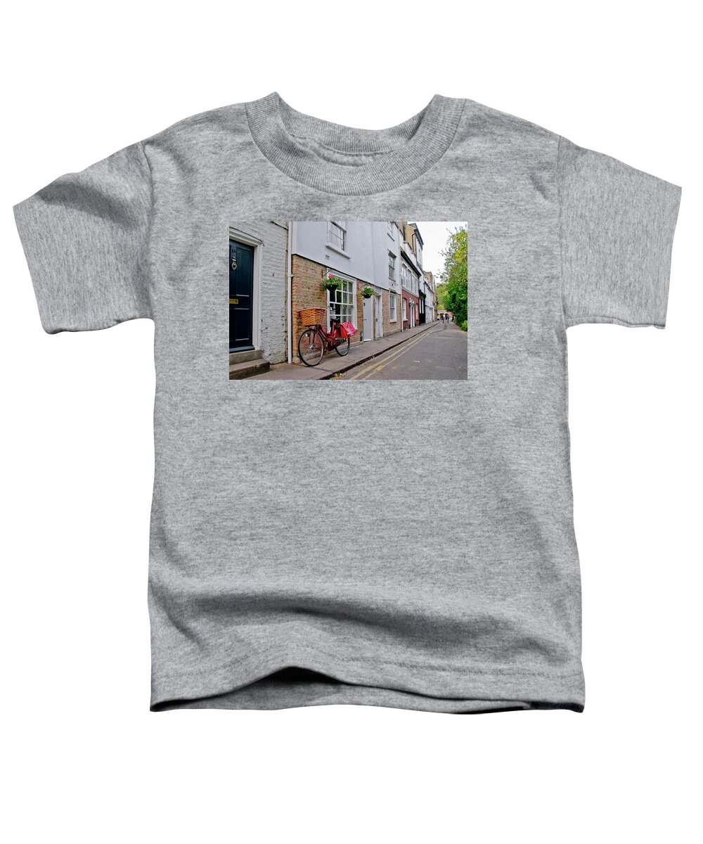 Cambridge Toddler T-Shirt featuring the photograph Afternoon with a bike. by Elena Perelman
