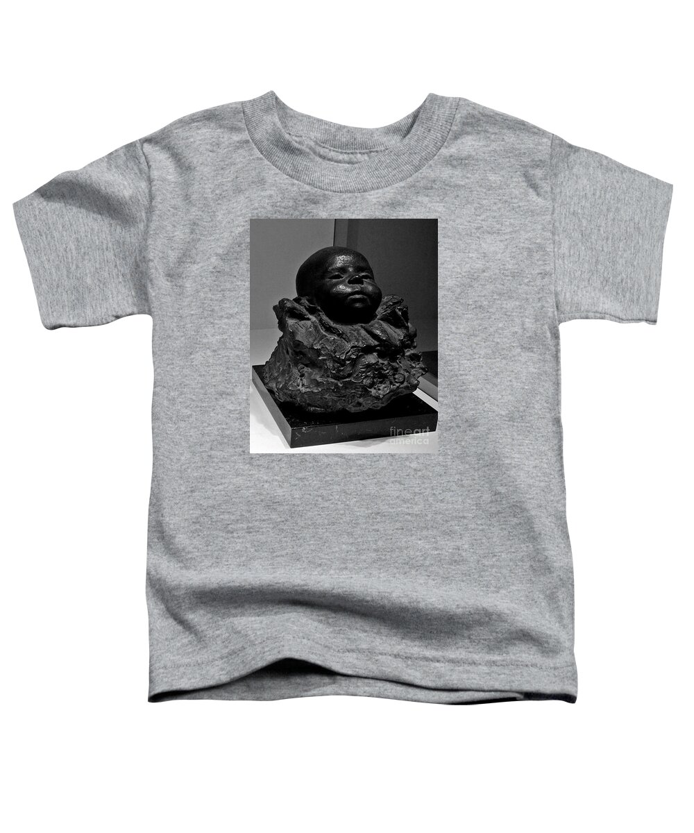 Photography Toddler T-Shirt featuring the photograph Baby face stone art by Francesca Mackenney
