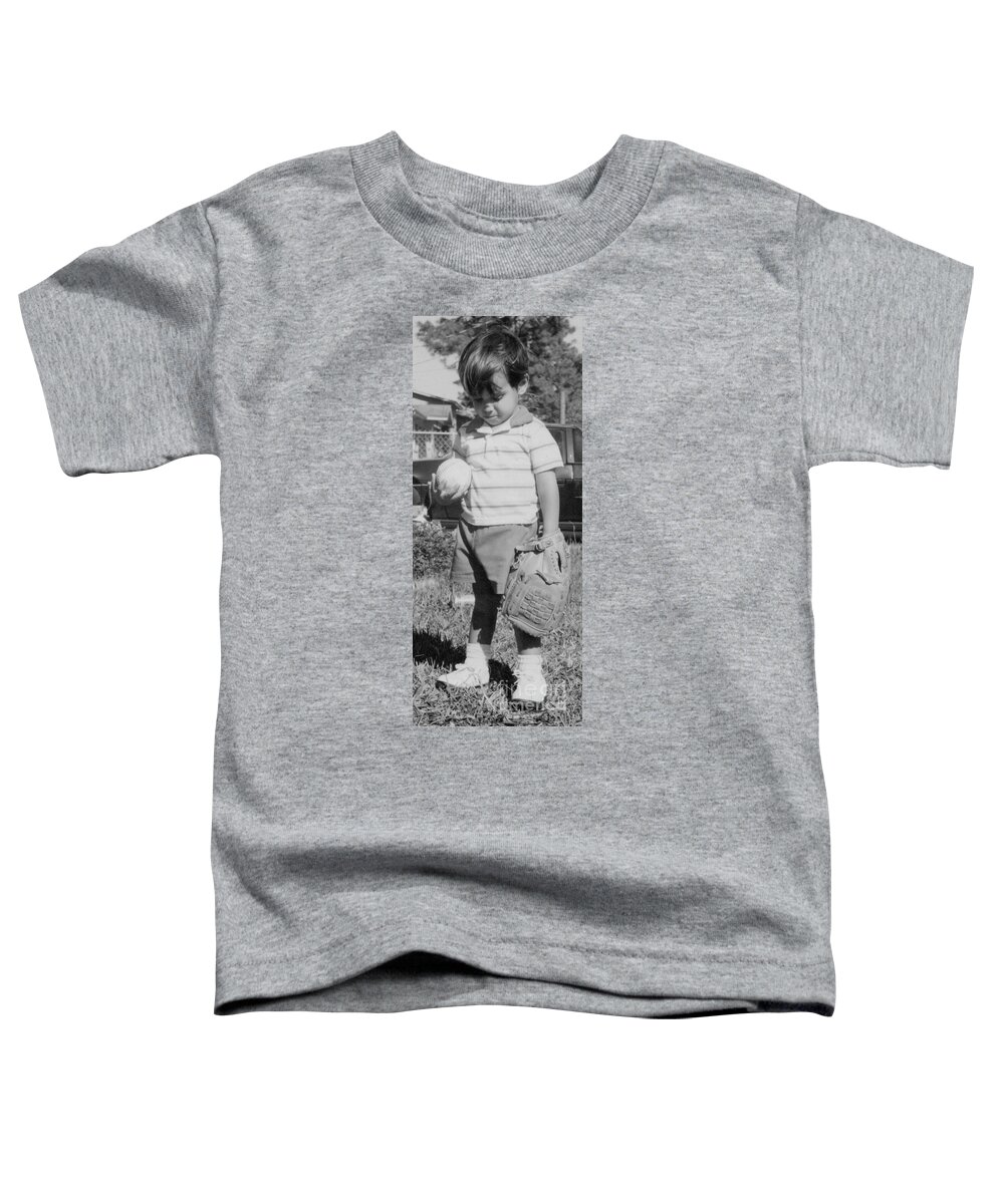 Baseball Toddler T-Shirt featuring the photograph But I wanna play catch some more. by WaLdEmAr BoRrErO