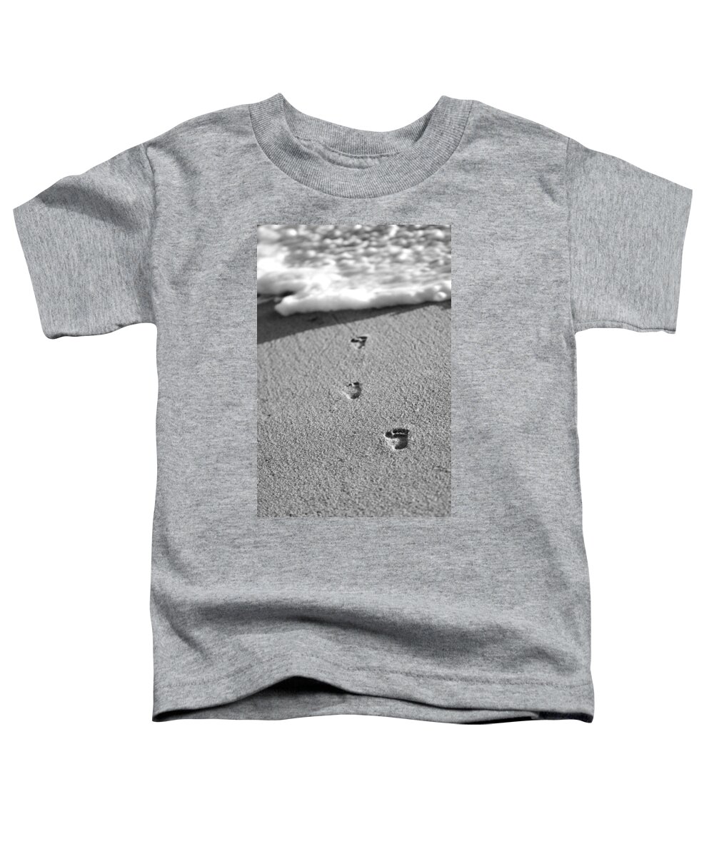Sand Toddler T-Shirt featuring the photograph Footprints in the Sand black and white by Jill Reger
