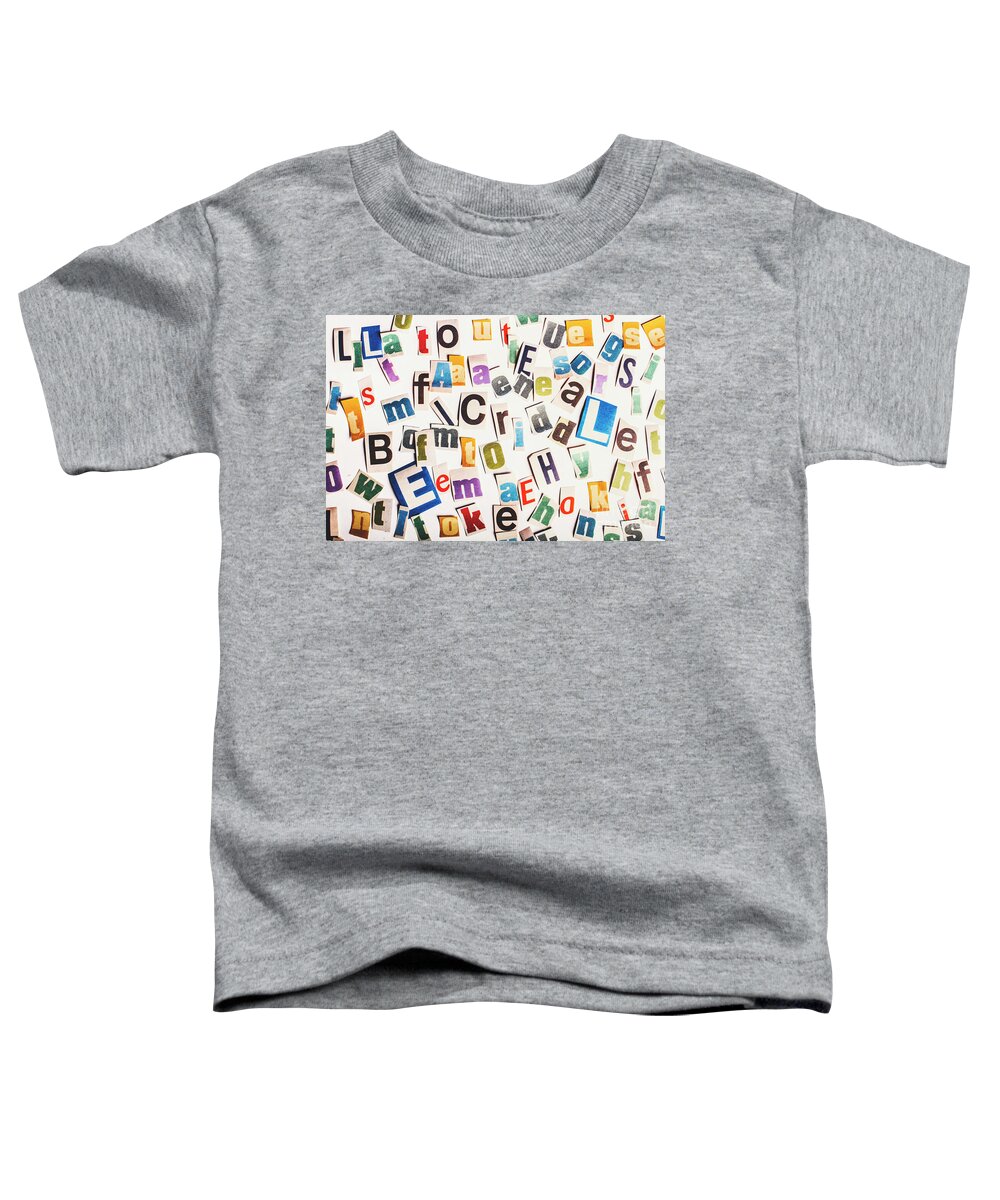 Newspaper Toddler T-Shirt featuring the photograph In clues of a riddle by Jorgo Photography