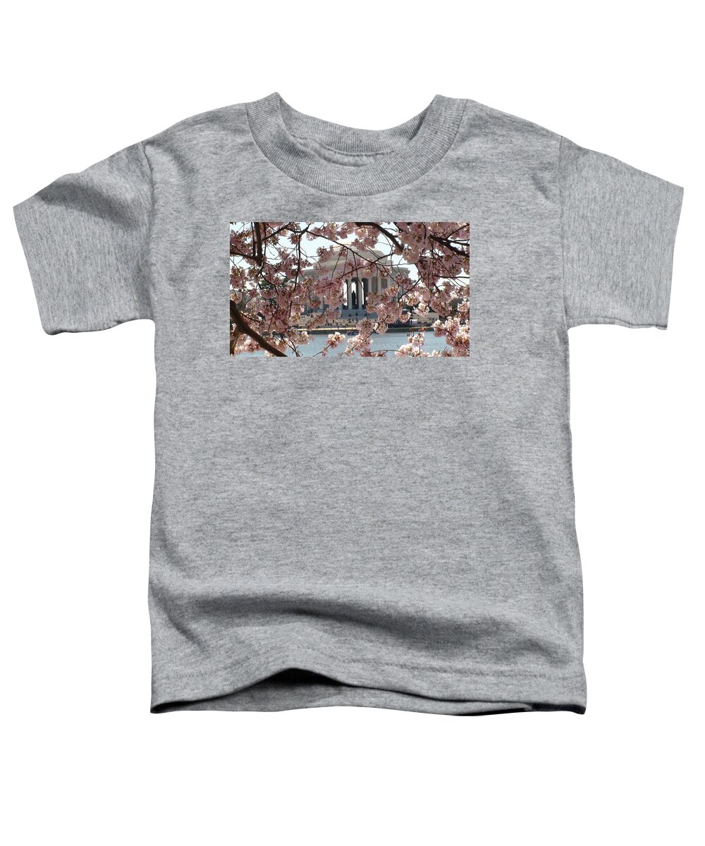 Jefferson Memorial Toddler T-Shirt featuring the photograph Jefferson Through the Cherry Blossoms by Charles Kraus
