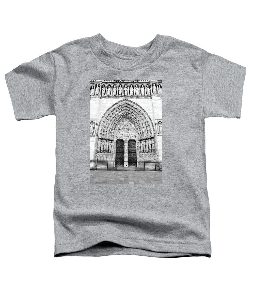 Travelpixpro Toddler T-Shirt featuring the photograph Notre Dame Cathedral Entrance Doors Arch Friezes and Statues Paris France Black and White by Shawn O'Brien