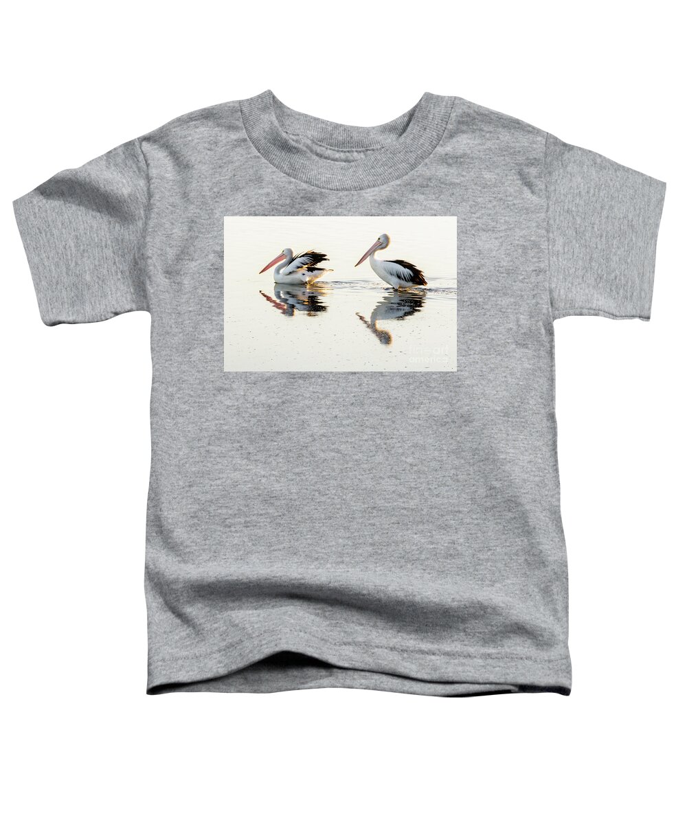 Bird Toddler T-Shirt featuring the photograph Pelicans at Dusk by Werner Padarin