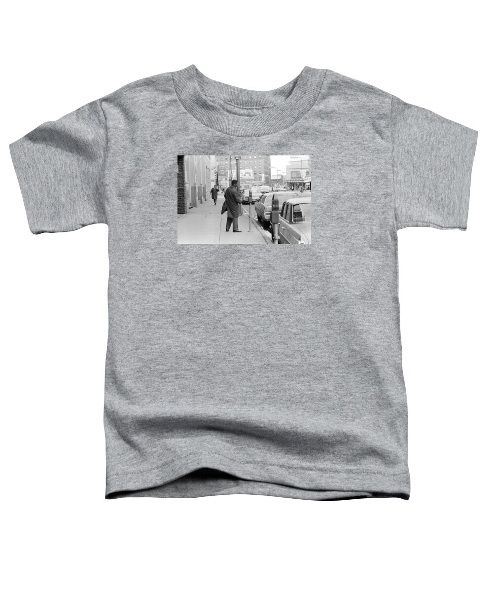 Actions Toddler T-Shirt featuring the photograph Plugging the meter by Mike Evangelist