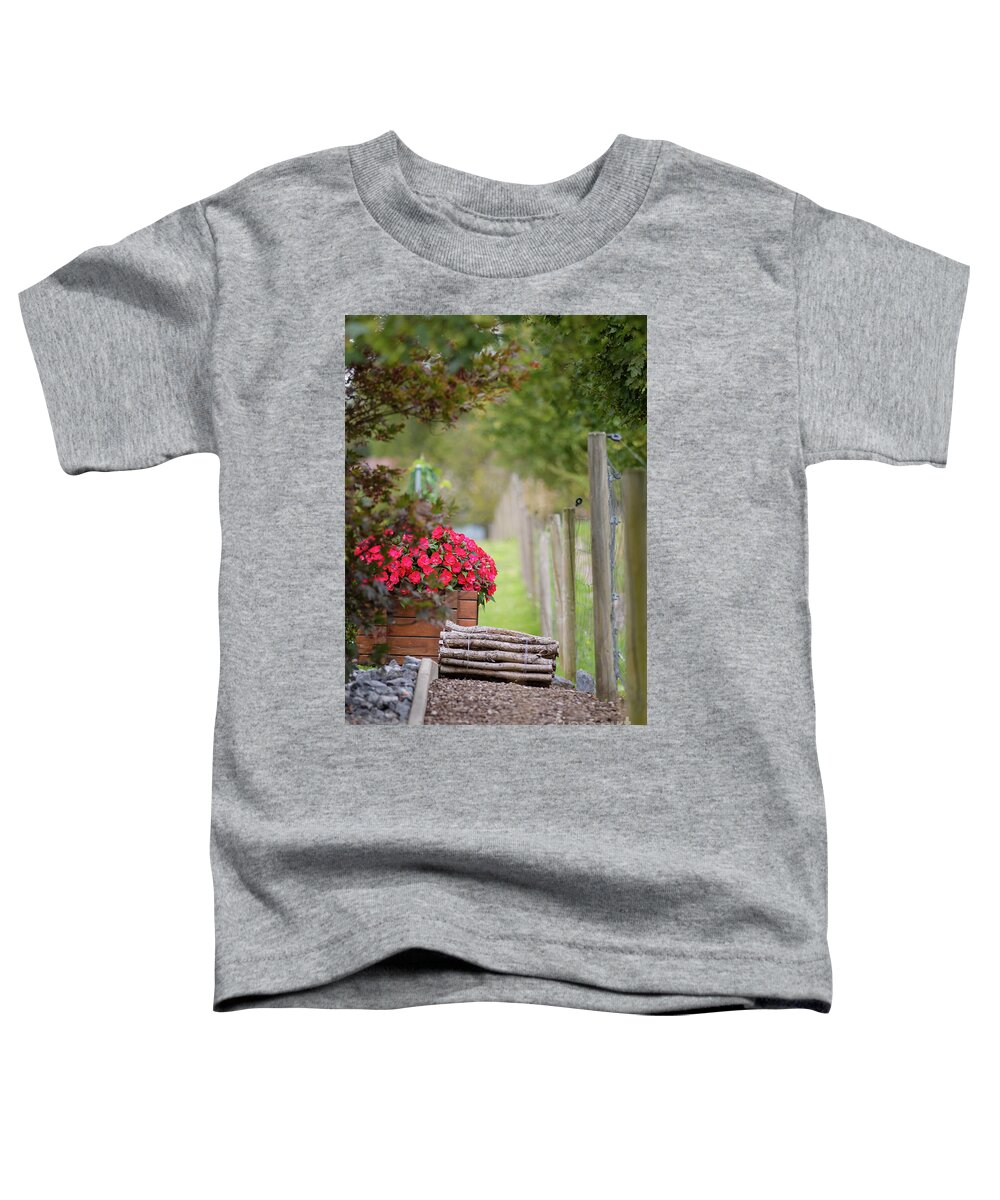 Country Toddler T-Shirt featuring the photograph Red flowerd with Fende and wood billet bundle by Amanda Mohler