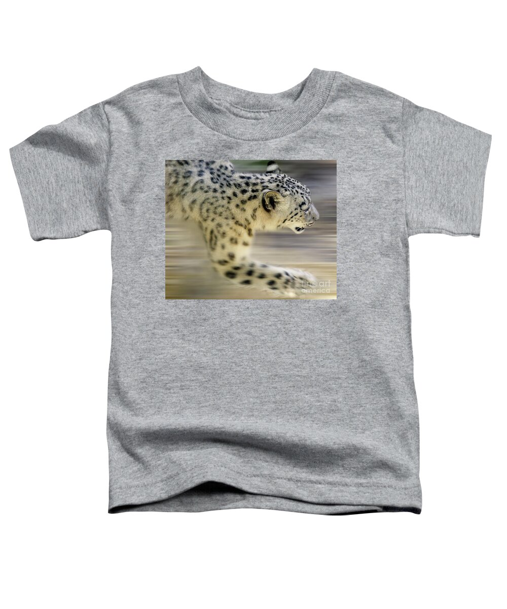 Snow Leopard Toddler T-Shirt featuring the photograph Snow Leopard On The Move by Bob Christopher