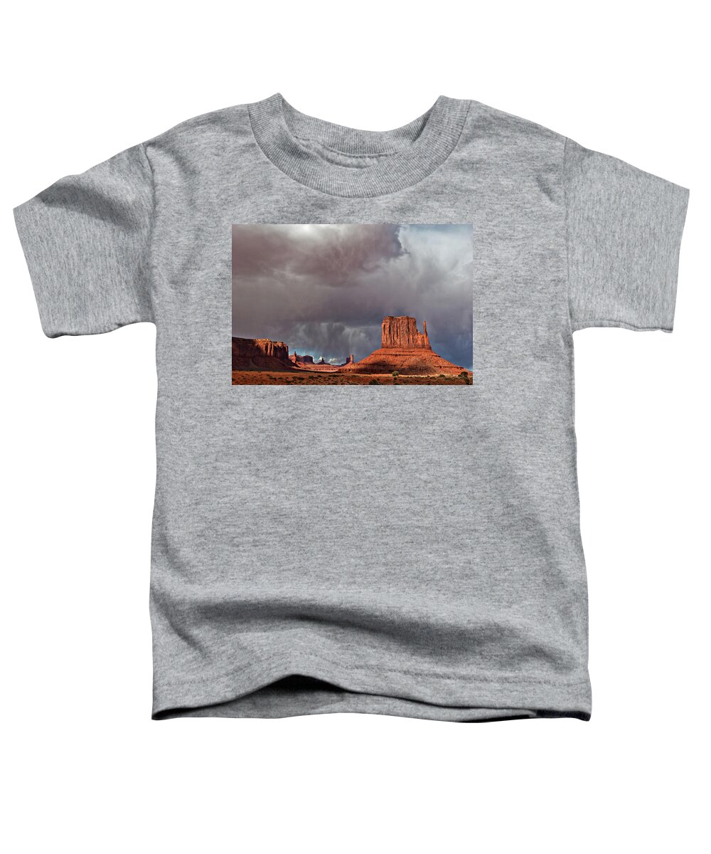 Desert Toddler T-Shirt featuring the photograph Storm over Monument Valley by Wesley Aston
