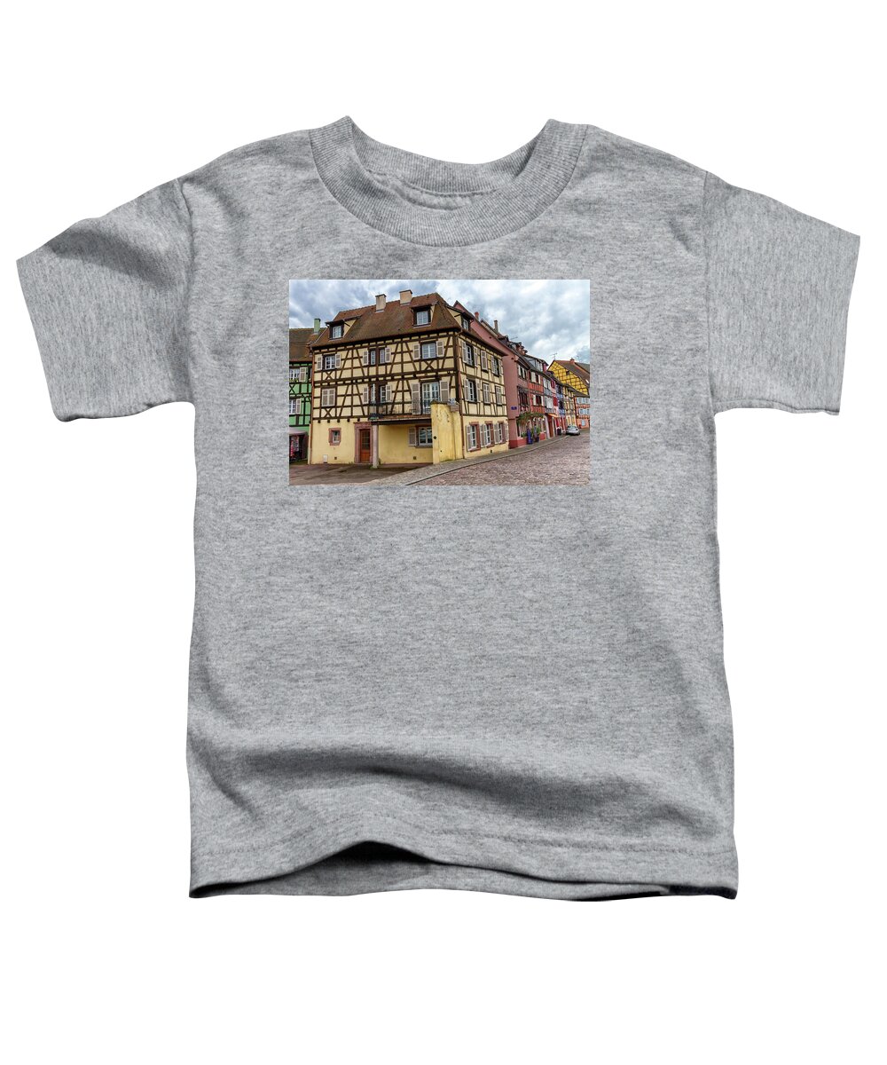 Colmar Toddler T-Shirt featuring the photograph Traditional half-timbered houses in Colmar, Alsace, France by Elenarts - Elena Duvernay photo