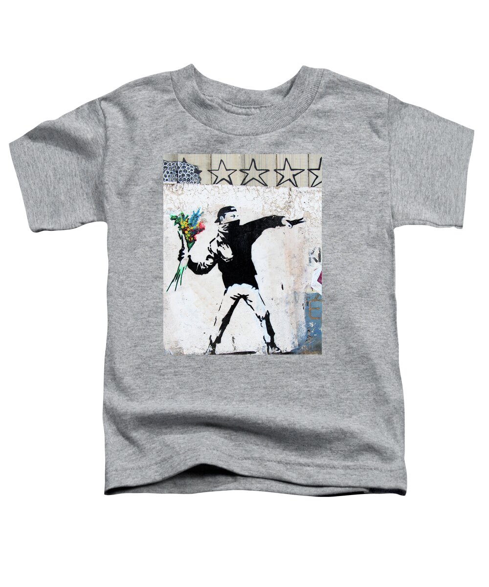 Banksy Replica Toddler T-Shirt featuring the photograph With Love and Flowers by Munir Alawi