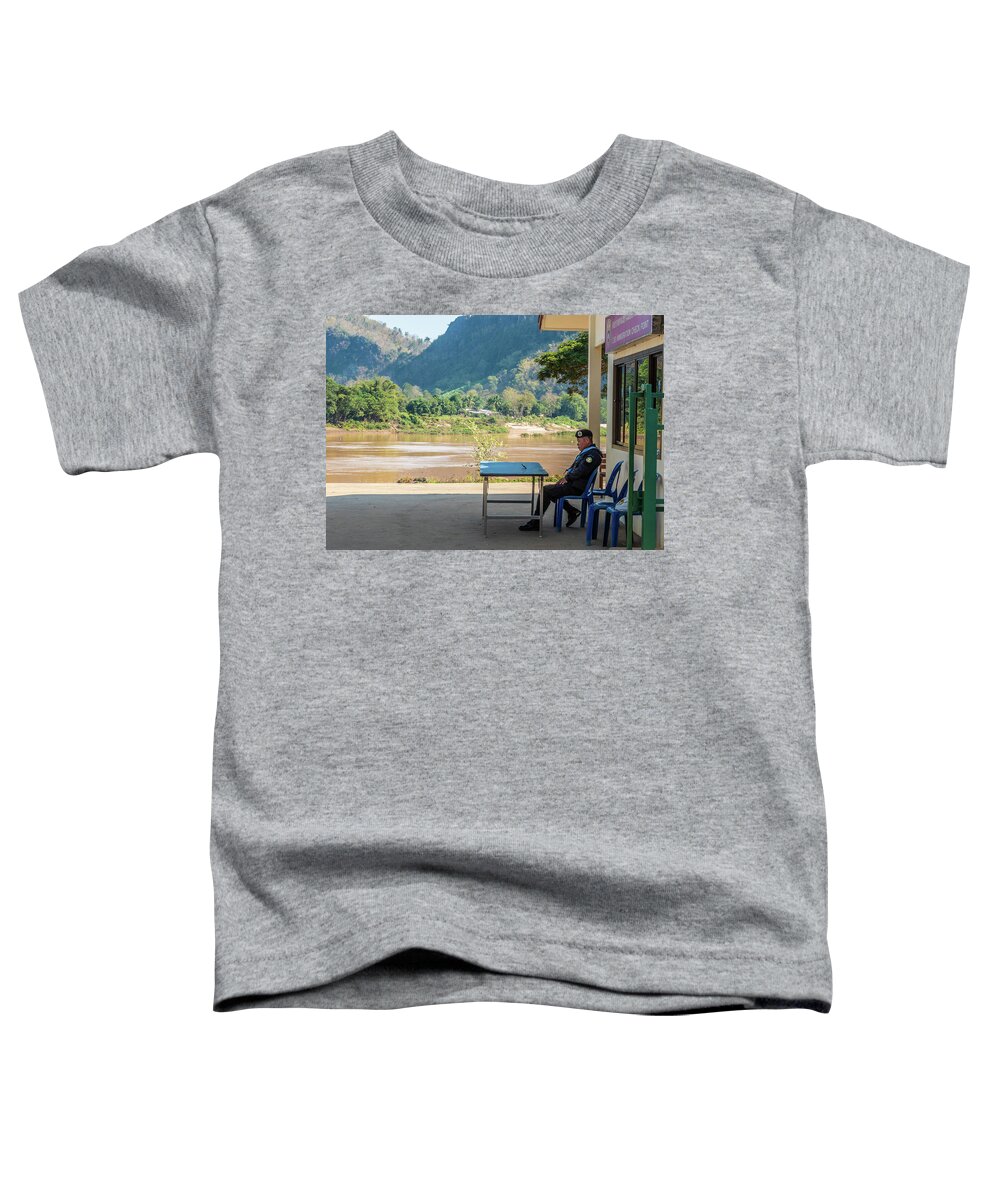 Laos Toddler T-Shirt featuring the photograph Border guard hard at work by Jeremy Holton