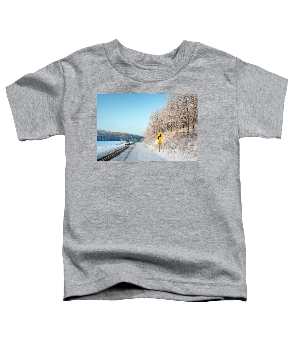 Rural Toddler T-Shirt featuring the photograph Driving on Dangerous Winter Roads by Todd Klassy