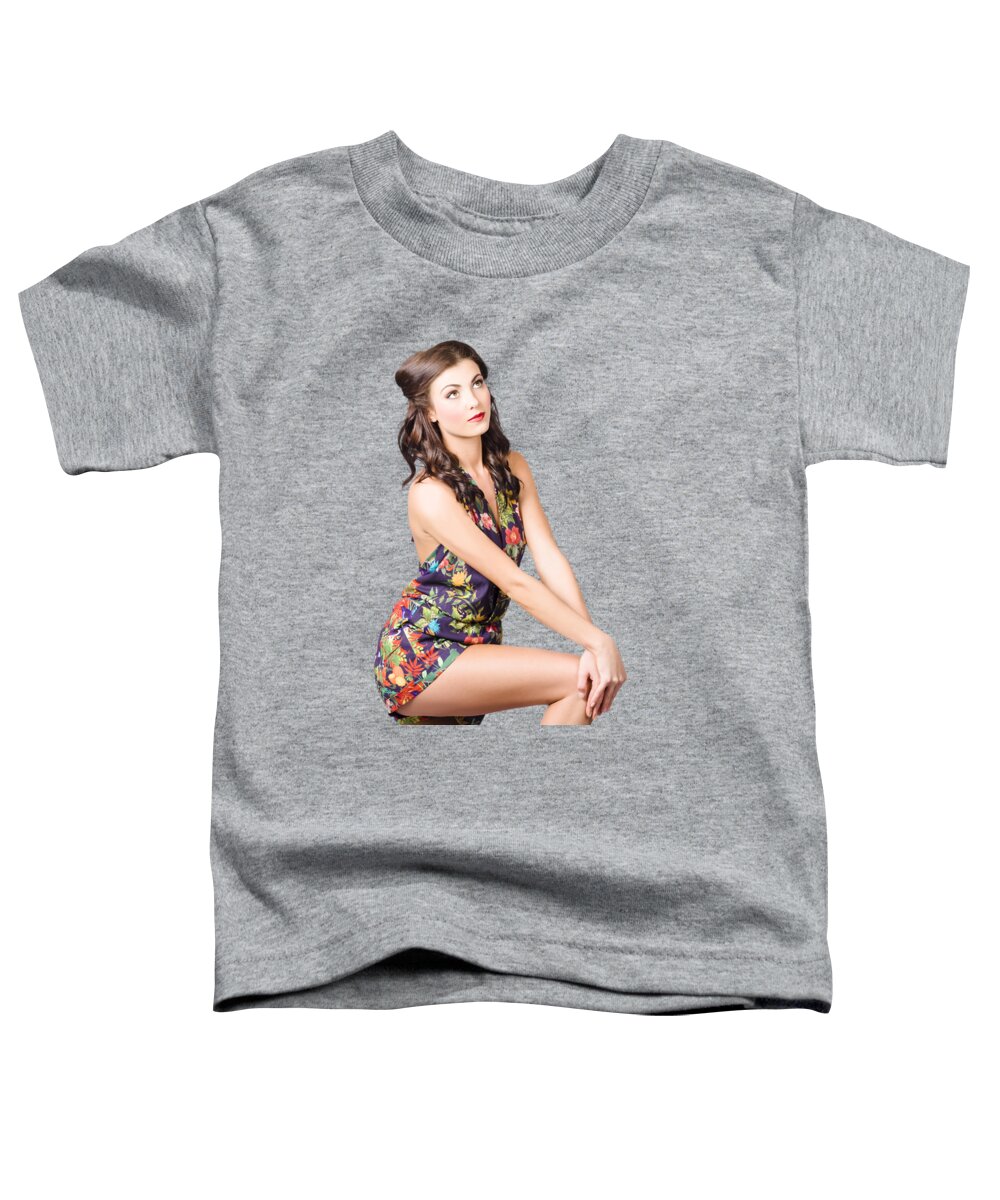 Fashion Toddler T-Shirt featuring the photograph Fashionable woman looking up on tan background by Jorgo Photography