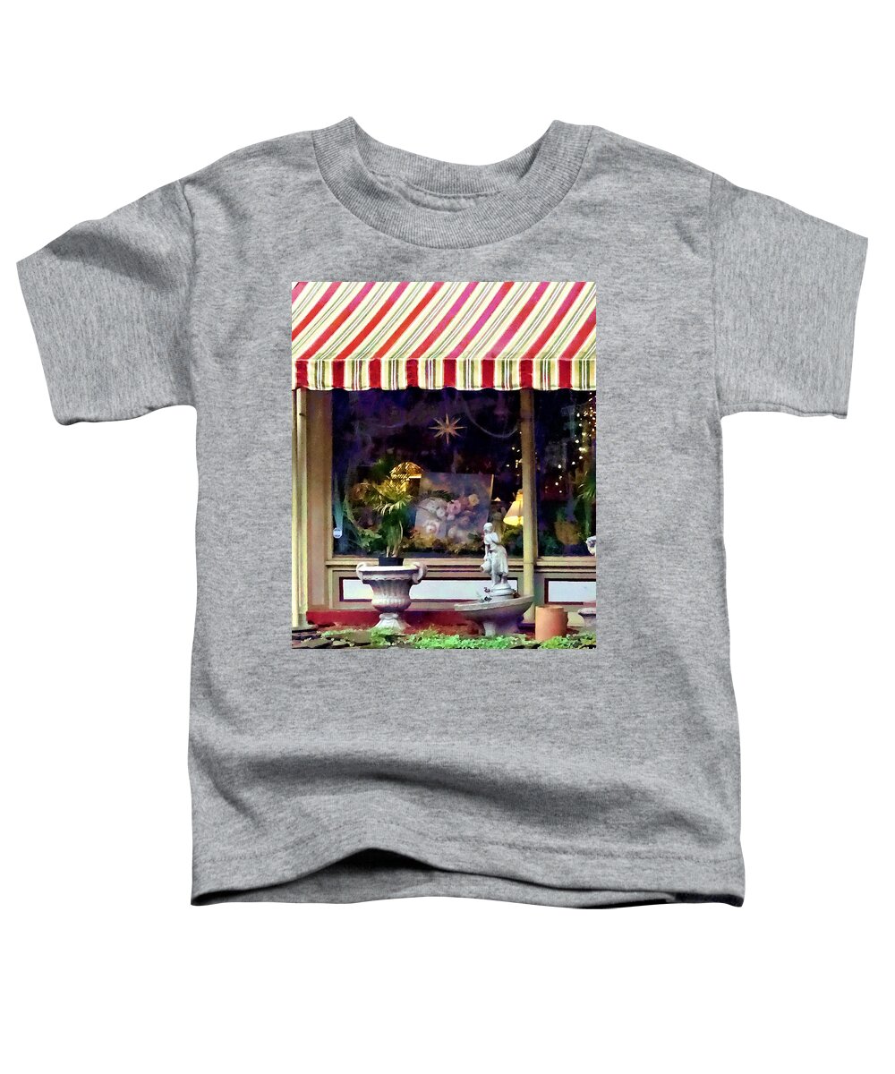 Owego Toddler T-Shirt featuring the photograph Owego NY - Gift Shop with Striped Awning by Susan Savad