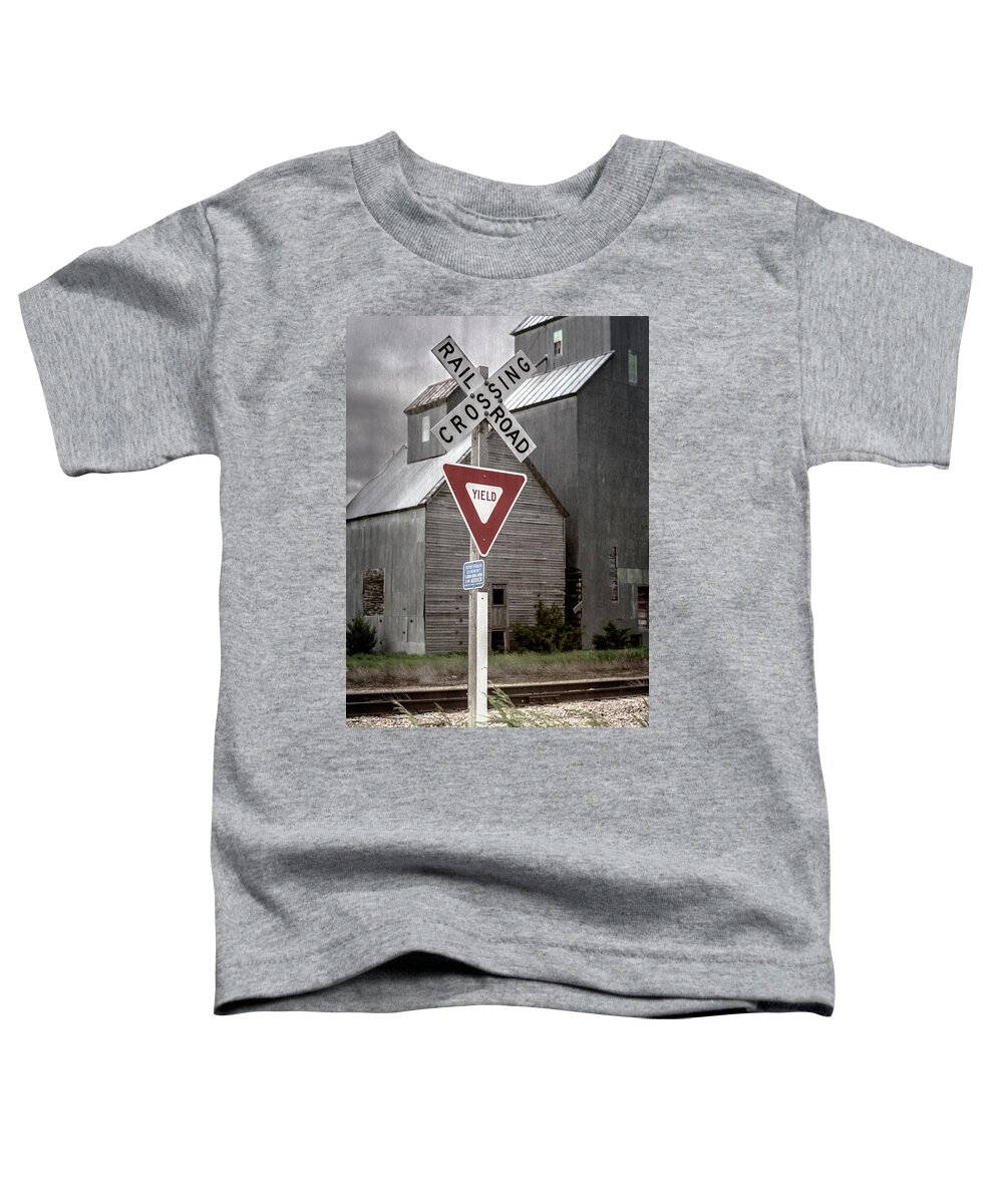 Joan Carroll Toddler T-Shirt featuring the photograph Railroad Crossing Cottonwood South Dakota II by Joan Carroll