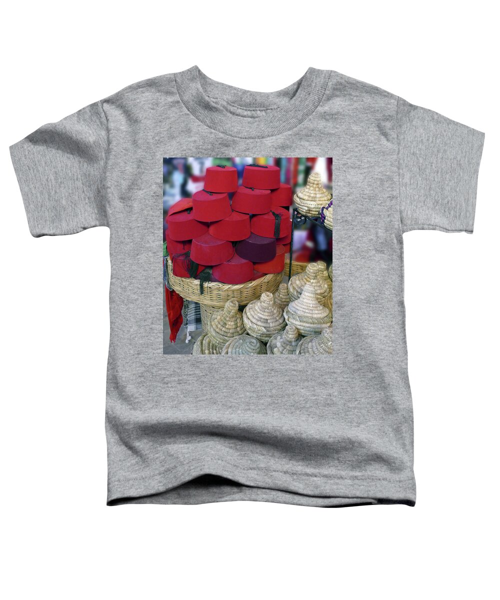 Marrakech Toddler T-Shirt featuring the photograph Red Fez tarbouche and white wicker tagine cookers by Steve Estvanik