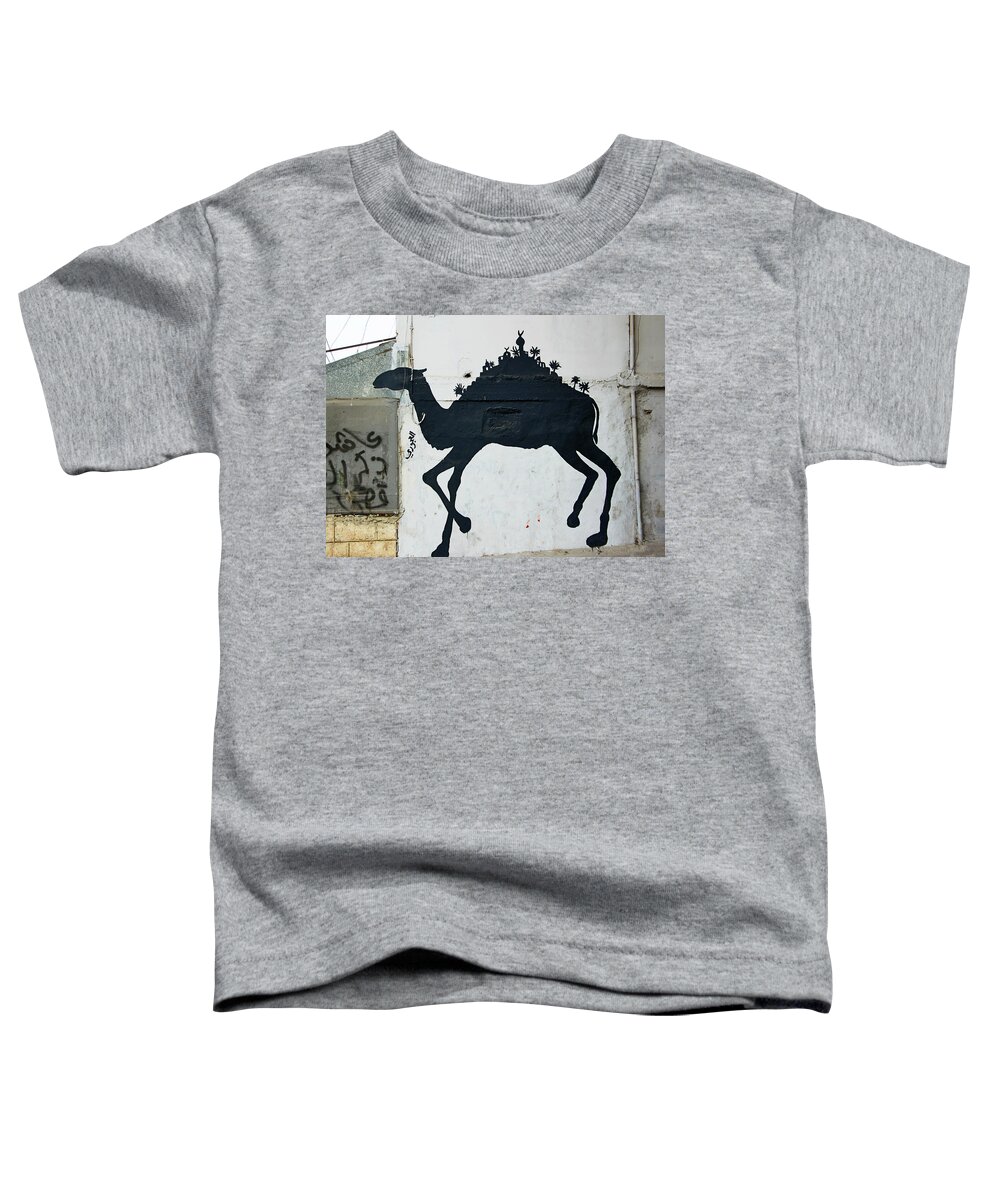 Refugee Camp Toddler T-Shirt featuring the photograph The Refugee Camp Camel by Munir Alawi