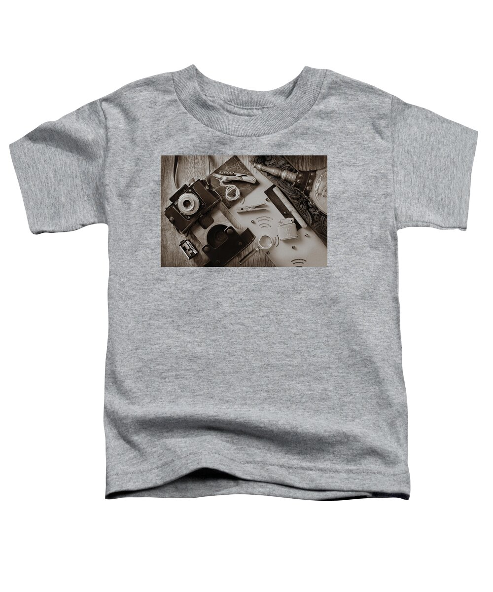 Accessory Toddler T-Shirt featuring the photograph Close up of the collection of vintage style objects by Severija Kirilovaite