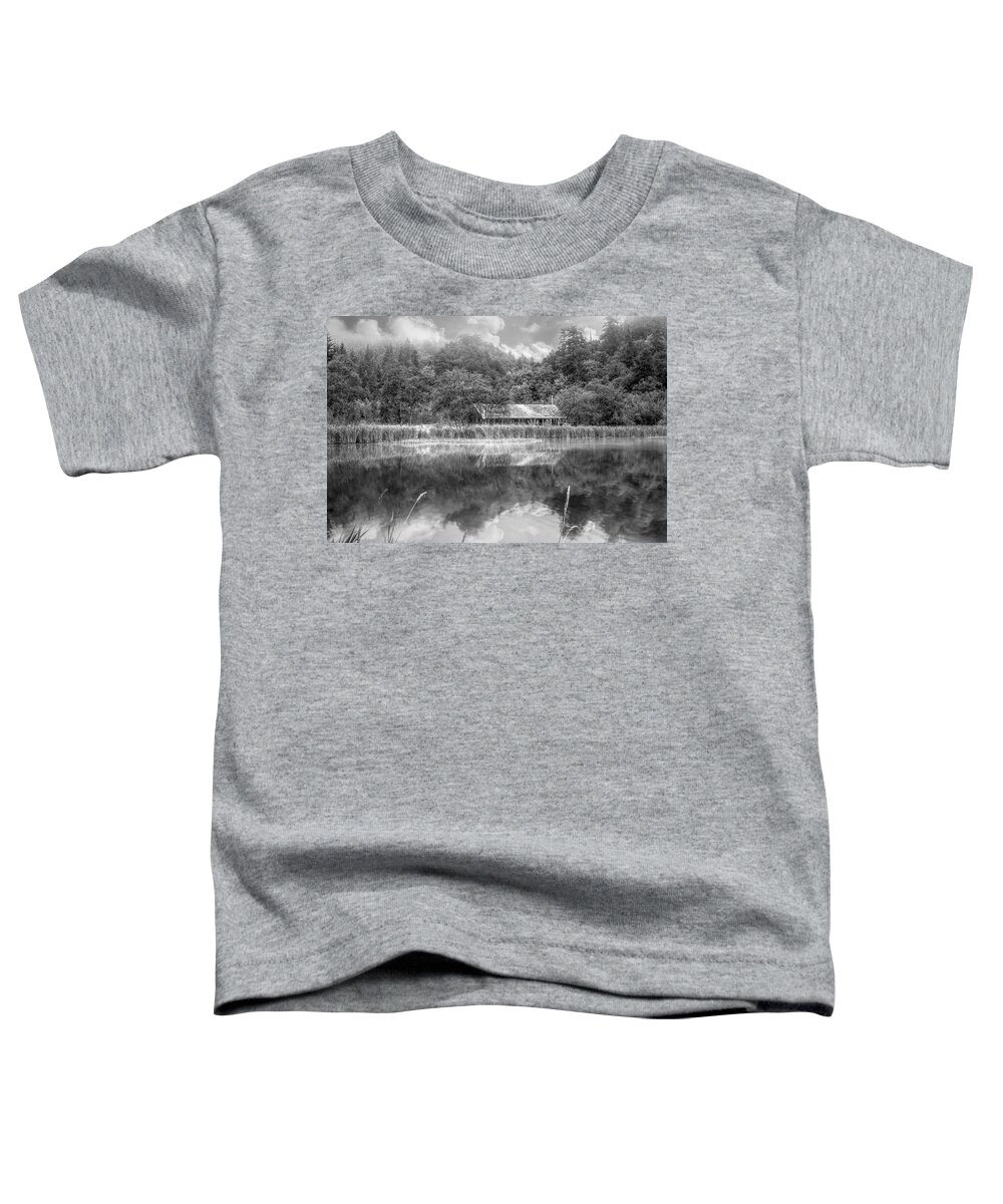 Barns Toddler T-Shirt featuring the photograph Farm on the Edge of the Lake in Black and White by Debra and Dave Vanderlaan