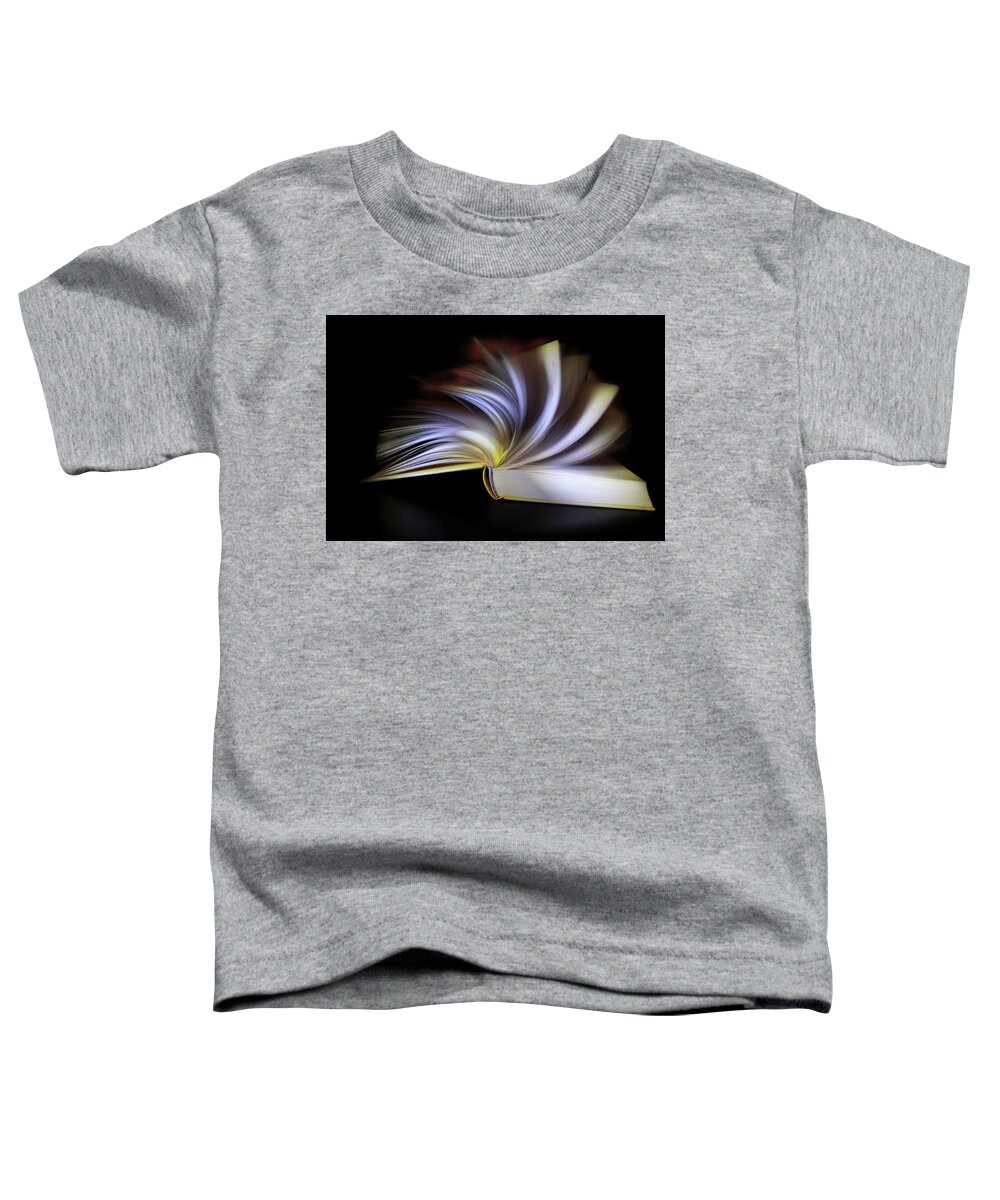 Education Toddler T-Shirt featuring the photograph Flying pages by Maria Dimitrova