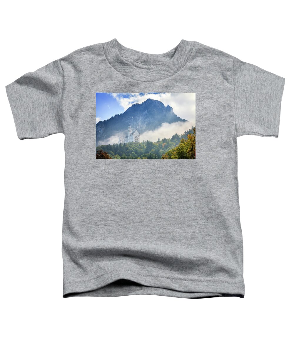 Alps Toddler T-Shirt featuring the photograph Neuschwanstein Castle in morning fog by Alexey Stiop