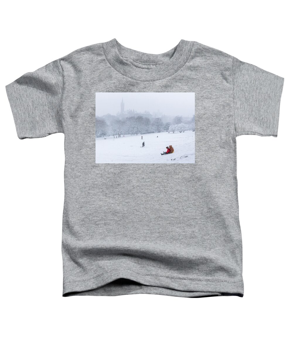 Adam West Toddler T-Shirt featuring the photograph Snow Sledging in Kelvingrove Park by Adam West