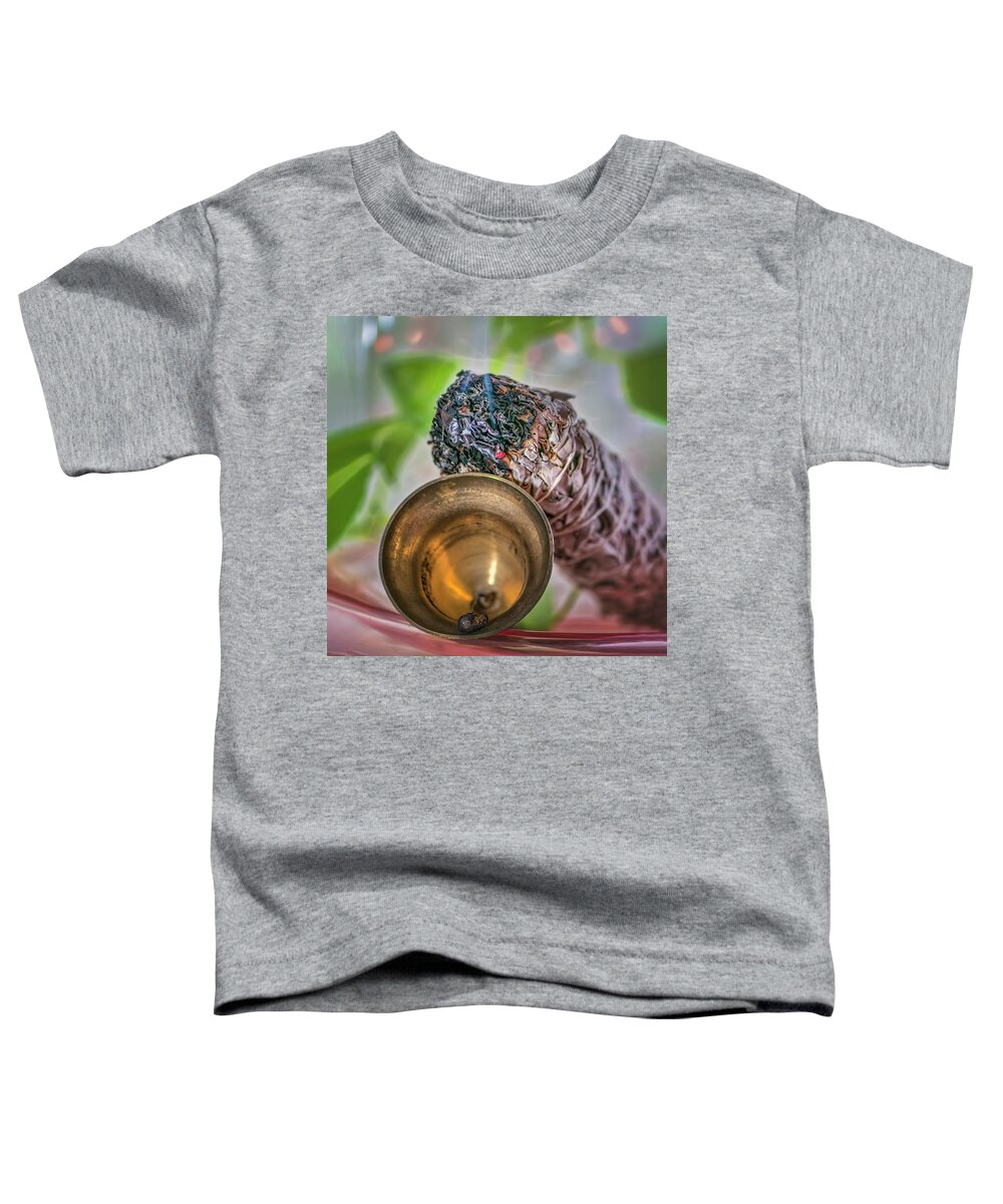 Still Life Toddler T-Shirt featuring the photograph Still life of sage burning and dinner bell by Cordia Murphy