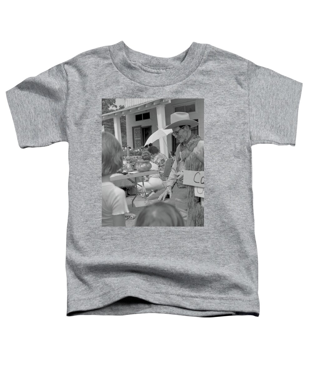 Georgia Toddler T-Shirt featuring the photograph Street Performer, Roswell, 1974 by John Simmons