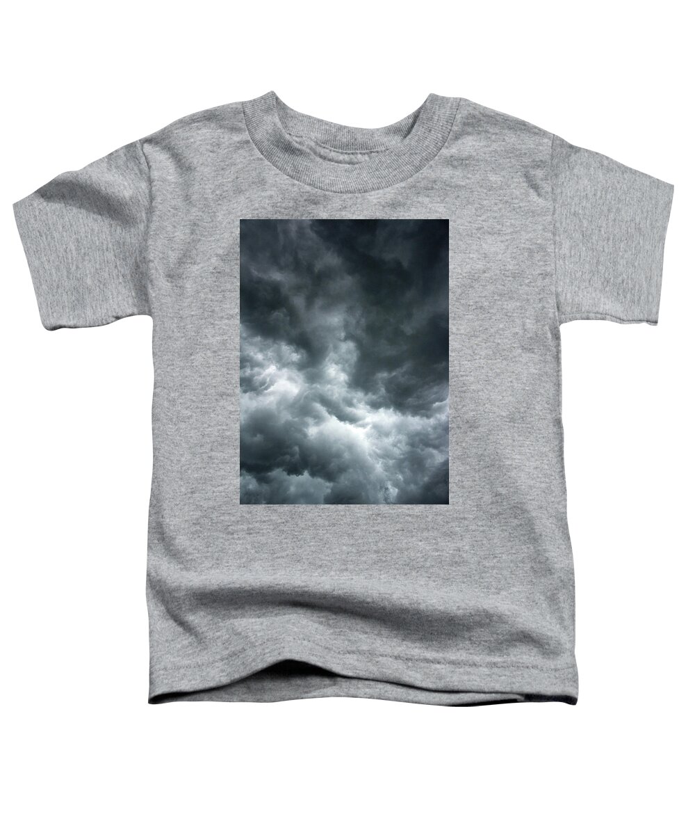 Clouds Toddler T-Shirt featuring the photograph Stormy clouds in the sky. by Bernhard Schaffer