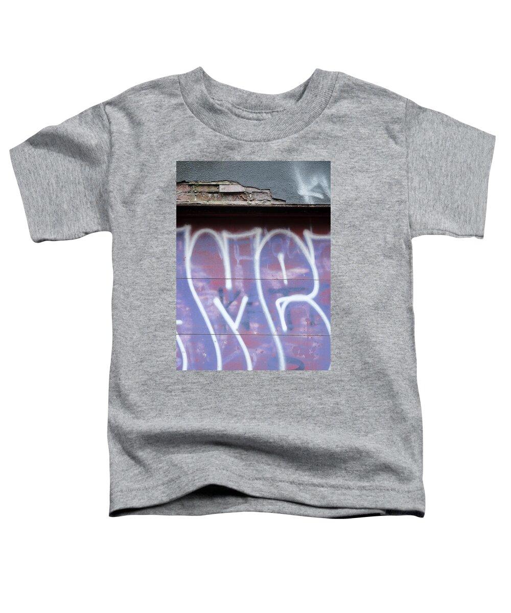 Urban Toddler T-Shirt featuring the photograph The Purple And White by Kreddible Trout