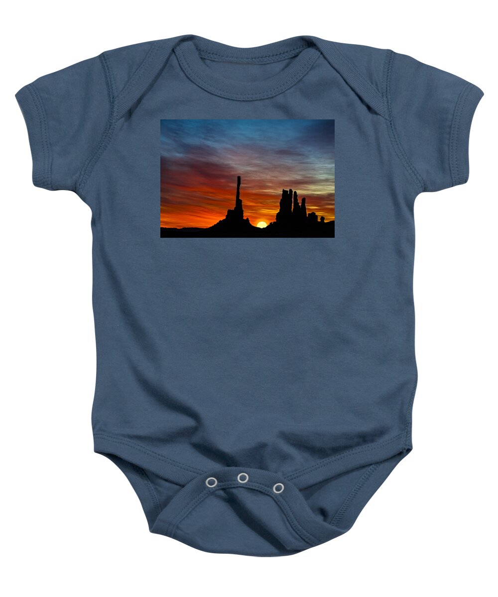 Sunrise Baby Onesie featuring the photograph A New Day At The Totem Poles #1 by Susan Candelario