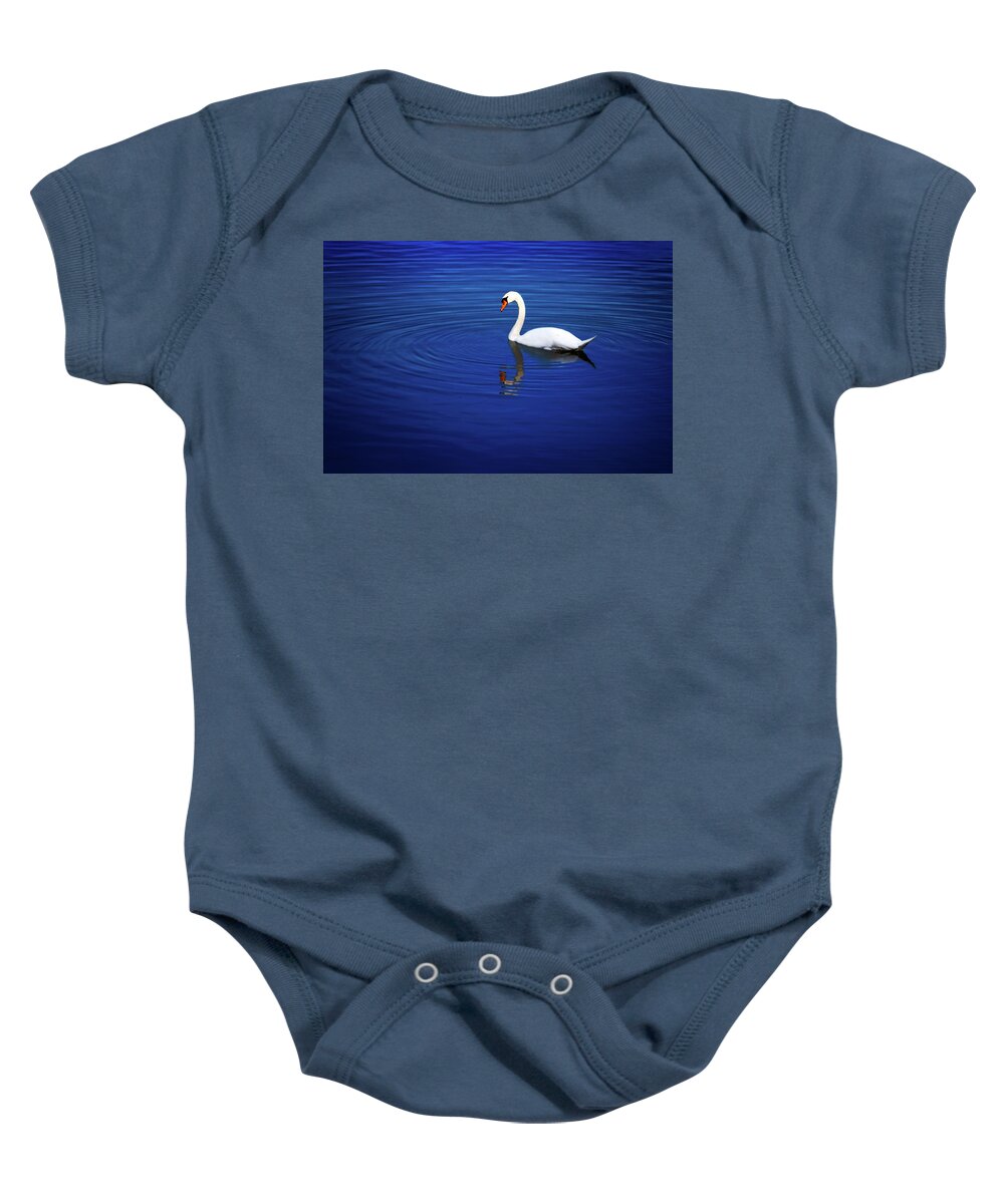 Animal Baby Onesie featuring the photograph A white swan in the lake by Tim Abeln