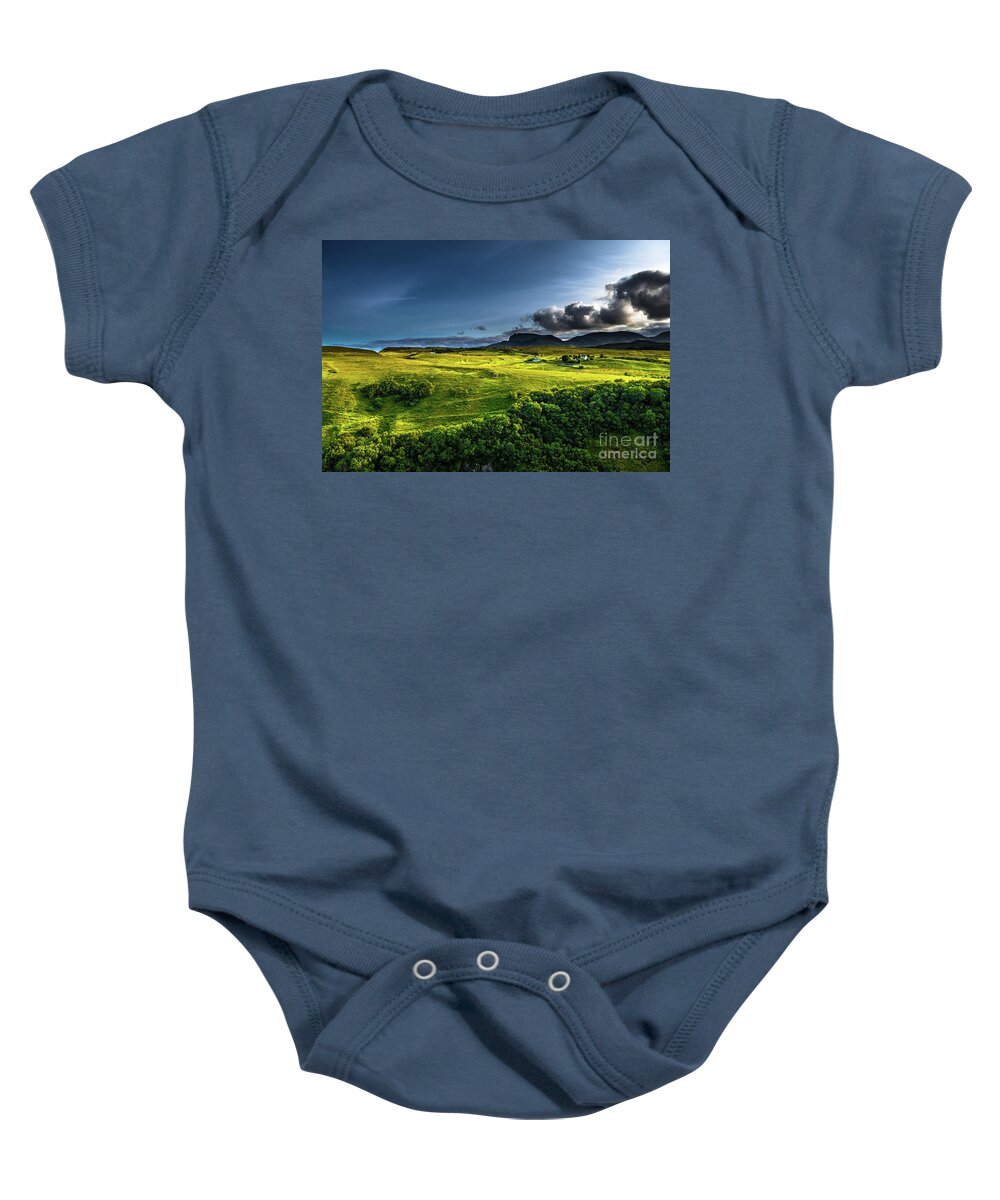 Background Baby Onesie featuring the photograph Rural Landscape With Remote Houses At The Old Man Storr Formation On The Isle Of Skye In Scotland by Andreas Berthold